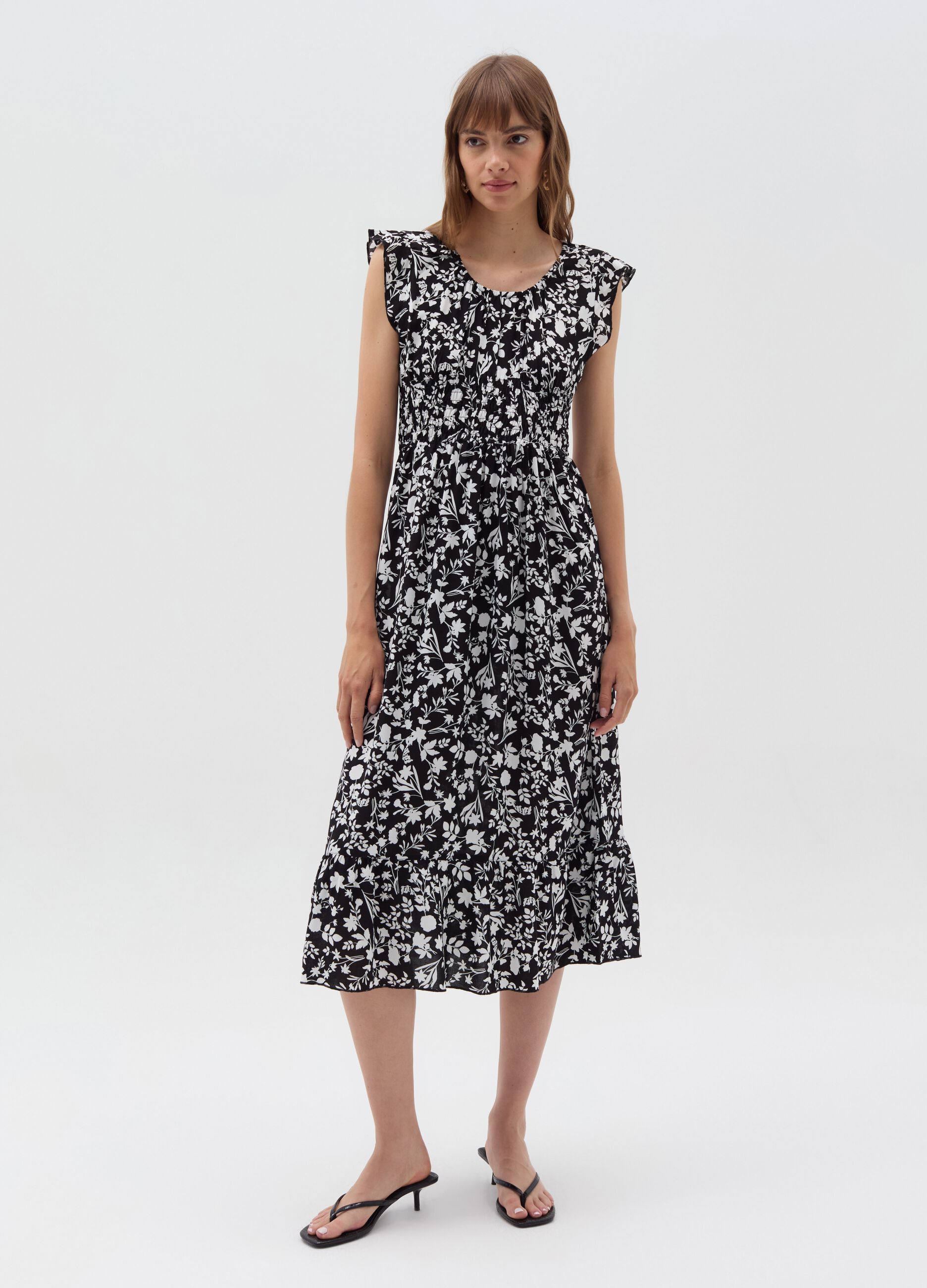 Long floral dress with smock stitch