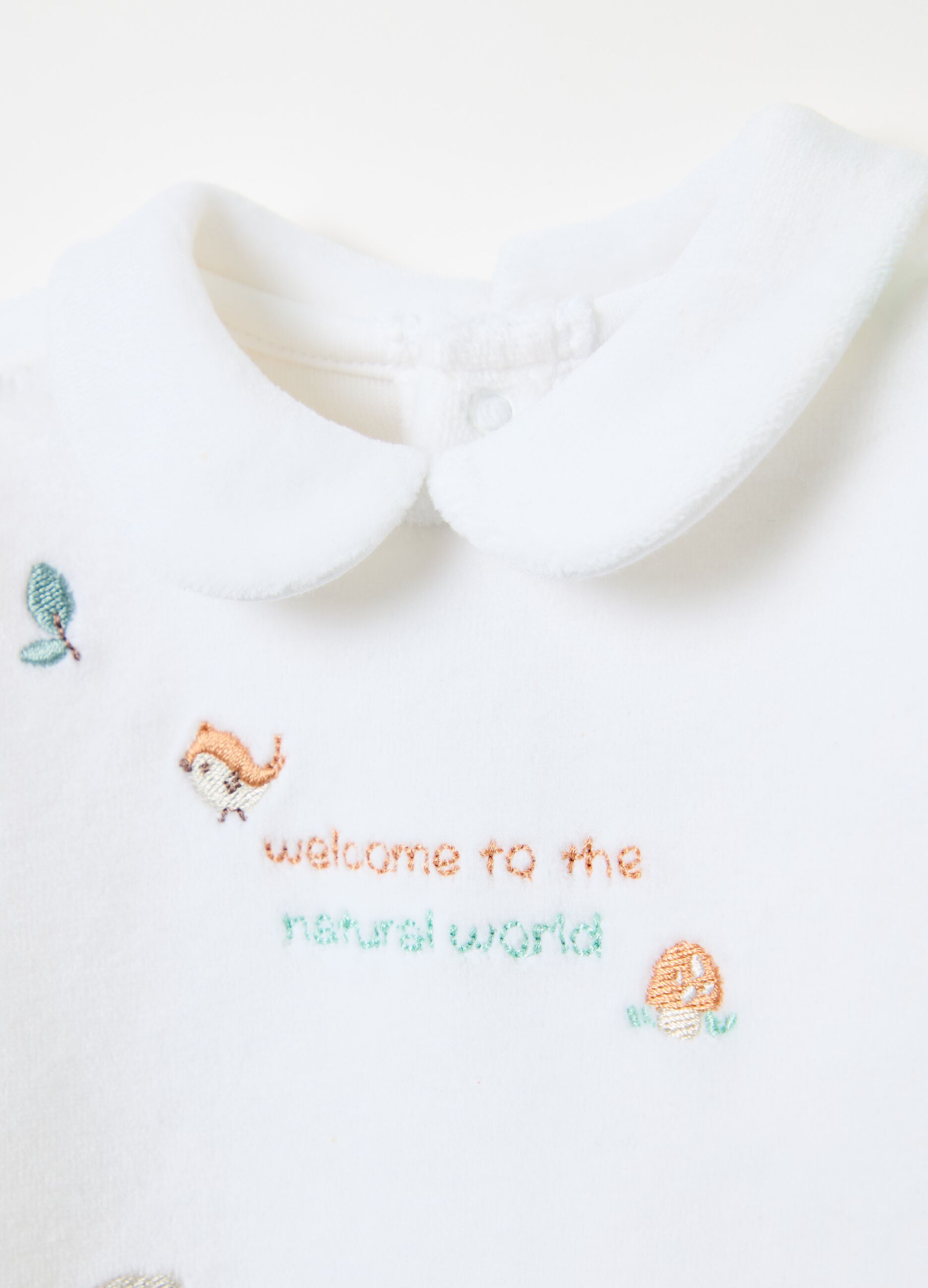 Velour onesie with feet and animals embroidery