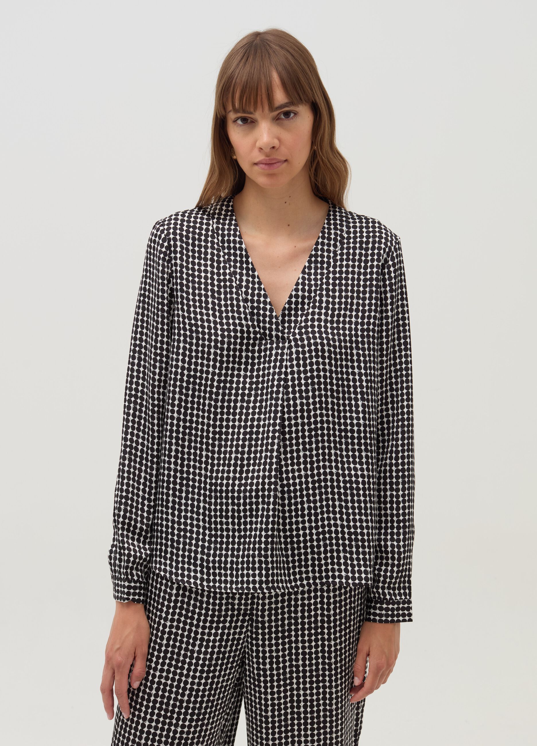 Blouse with polka dot pattern