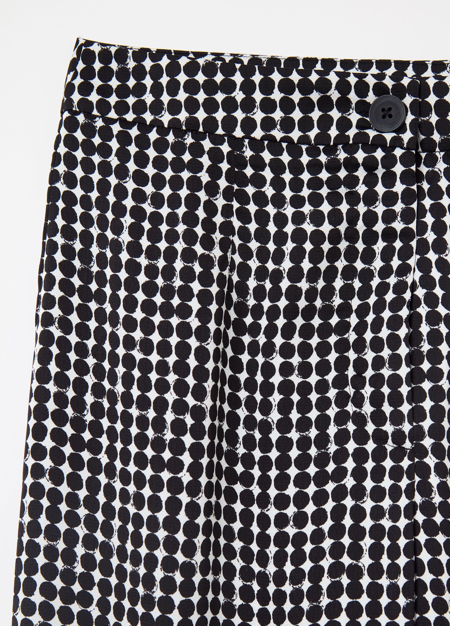 High-rise trousers with polka dot pattern