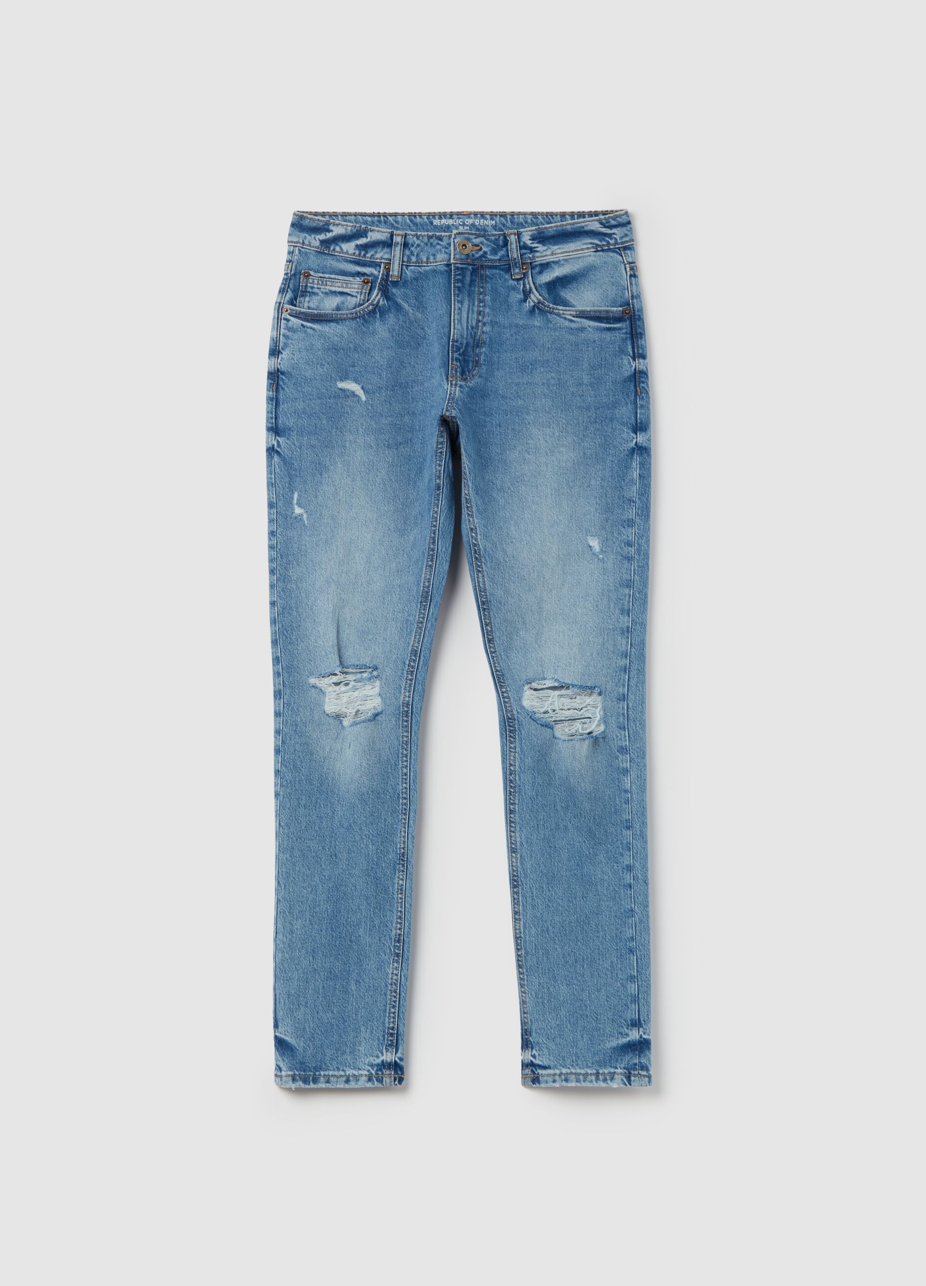 Slim-fit acid-wash jeans with abrasions