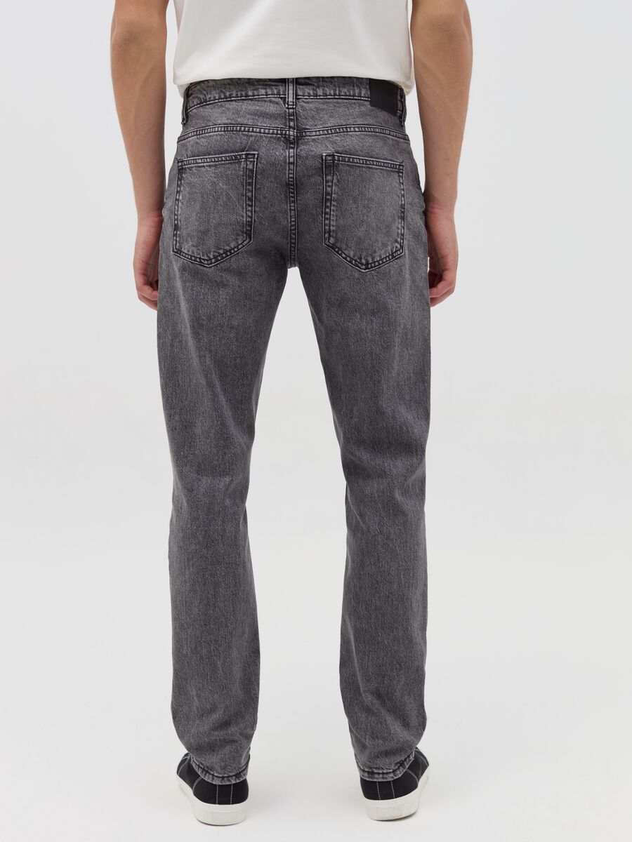 Slim-fit acid-wash jeans with abrasions_3