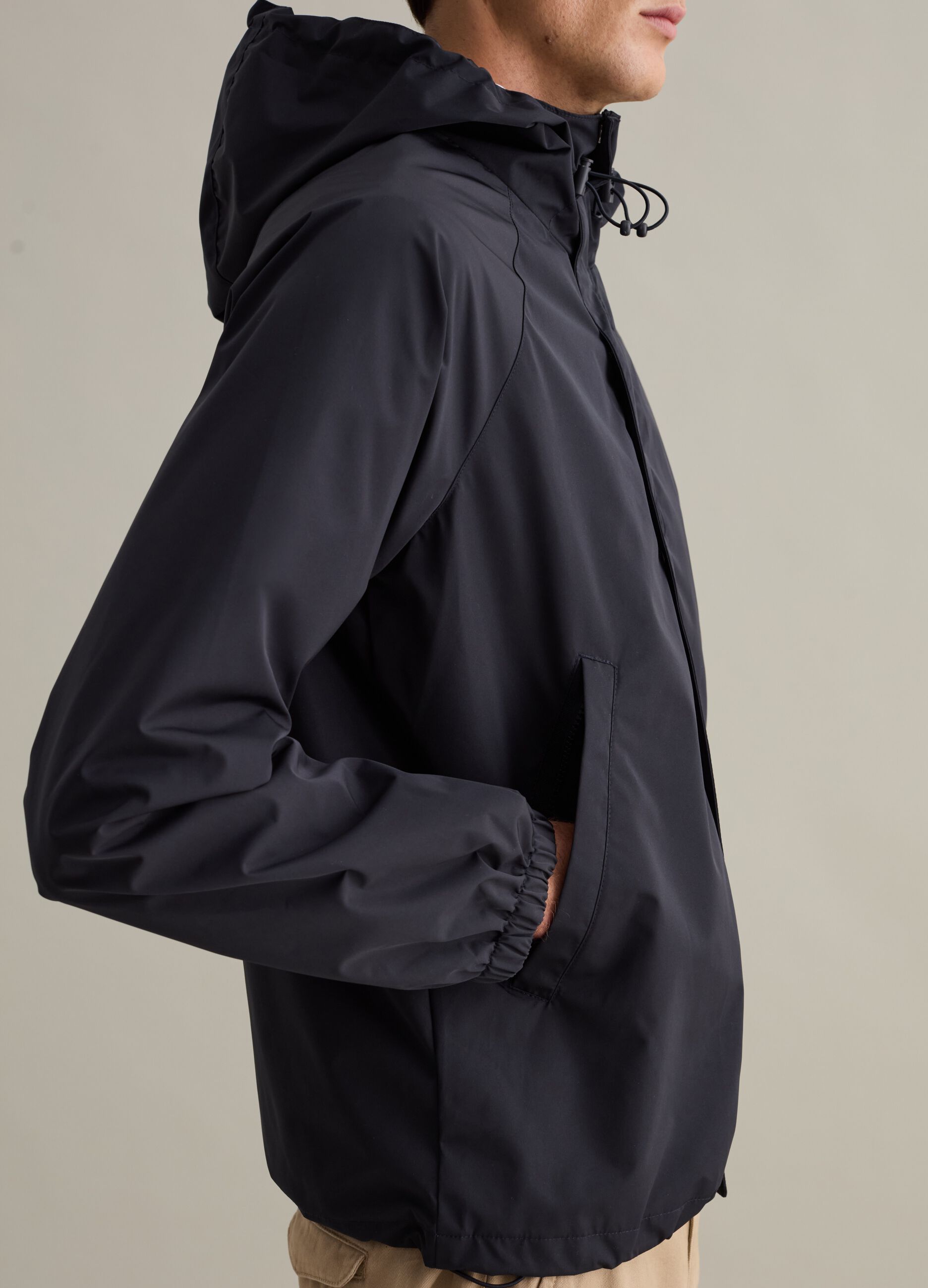 Short waterproof jacket with hood