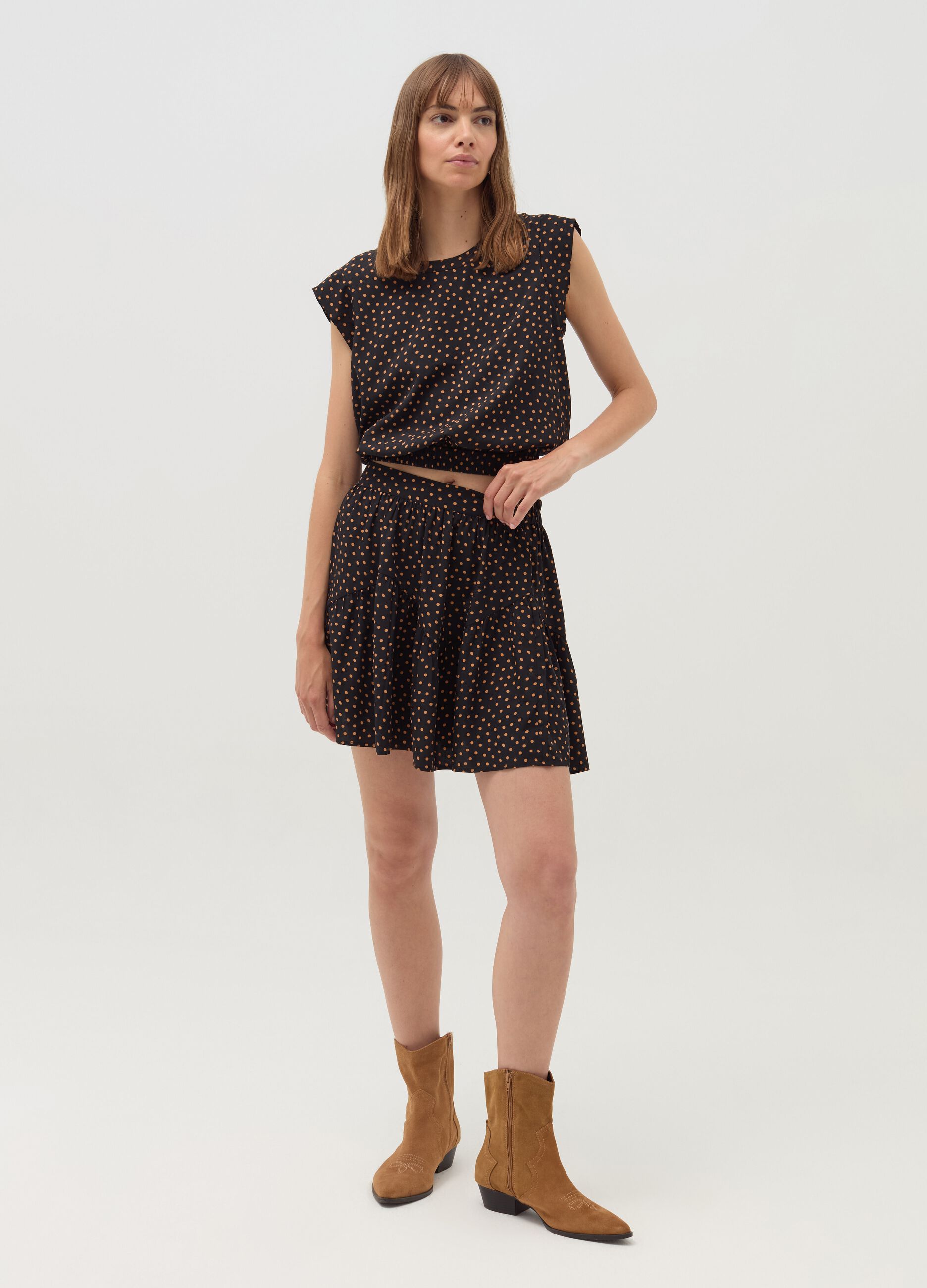 Short polka dot skirt with flounce