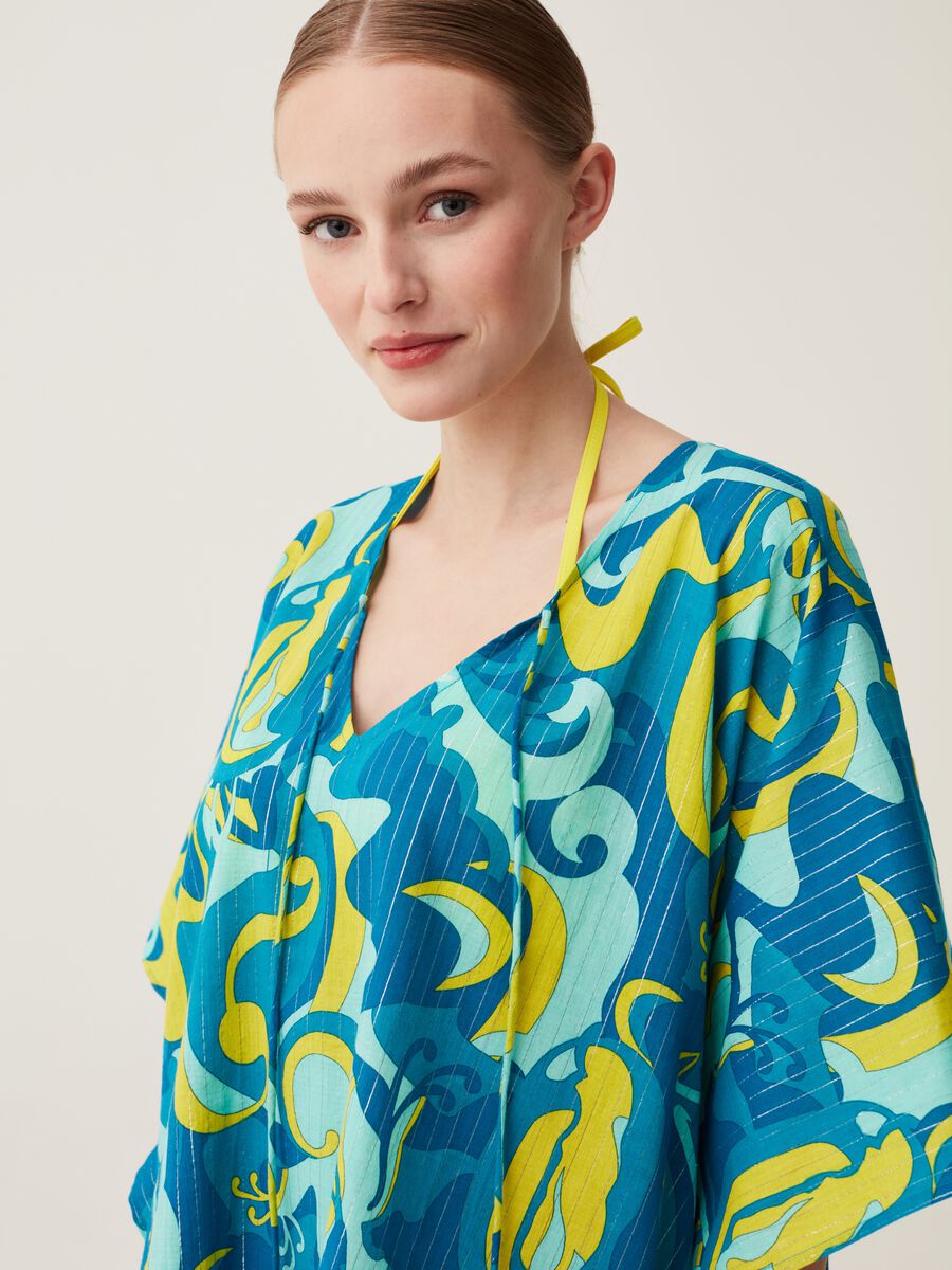 Beach cover-up poncho with all-over print_1