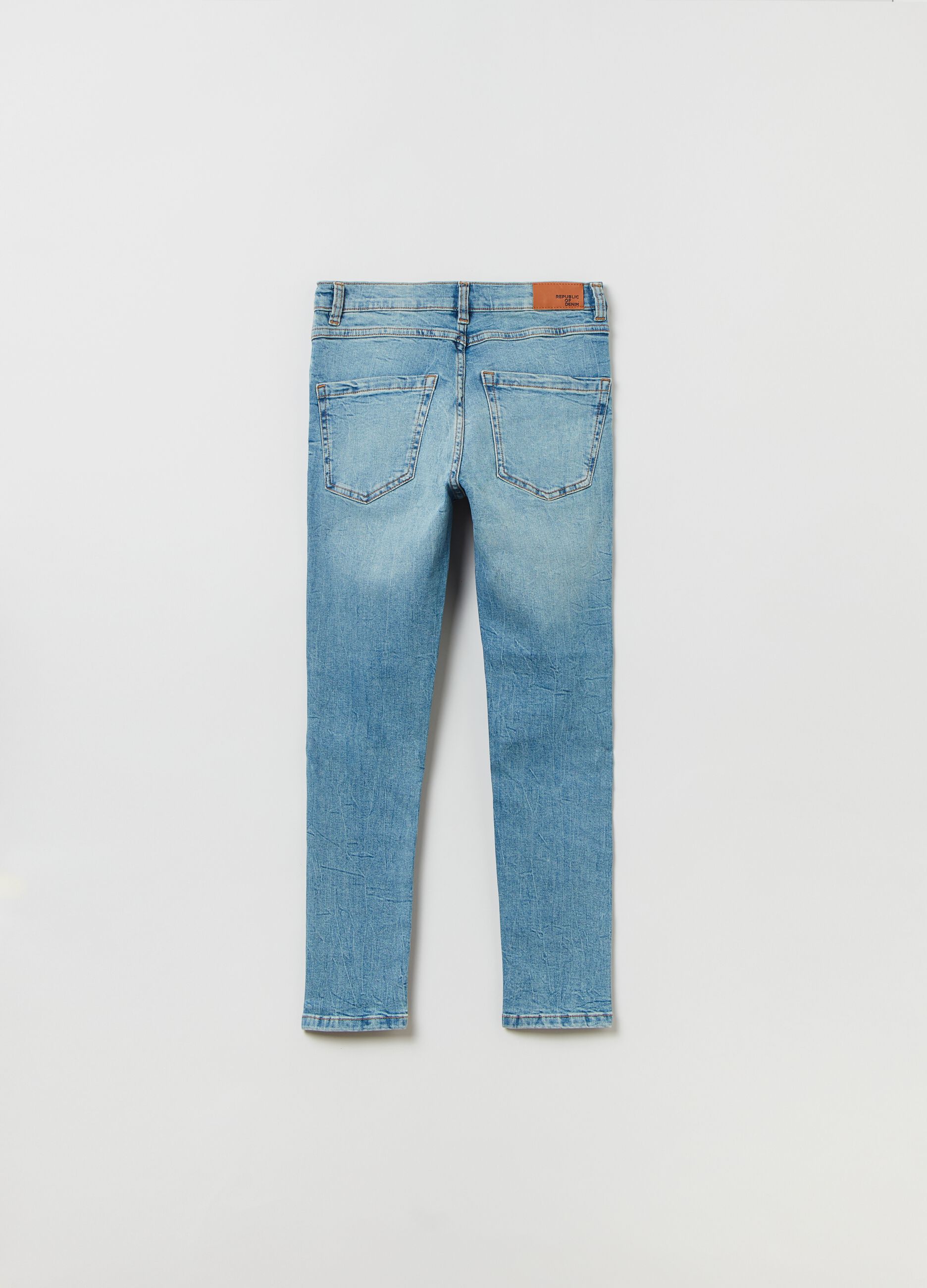 Carrot-fit jeans with rips