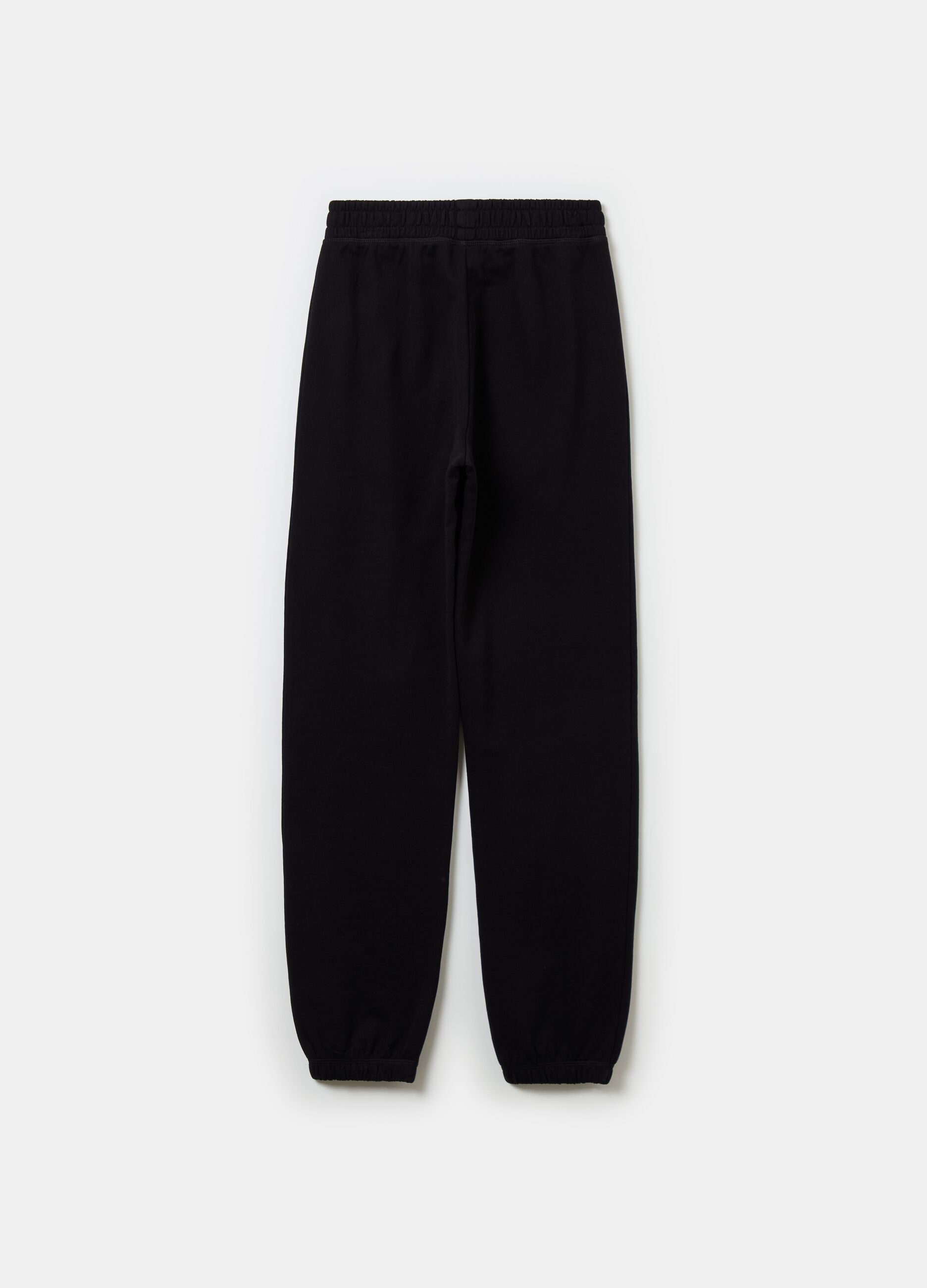 Joggers in fleece with elasticated edging and print