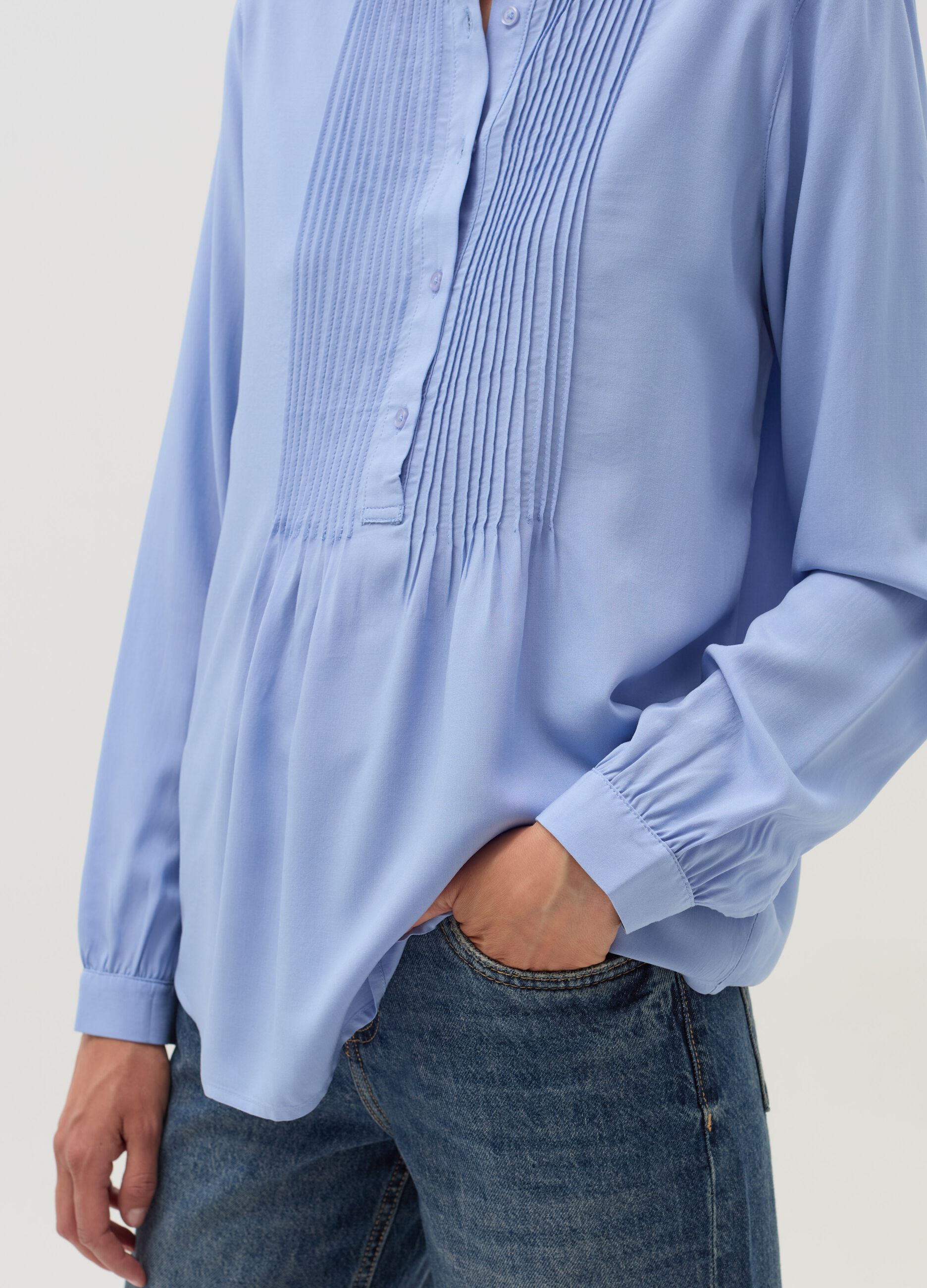 Shirt with pleated detail