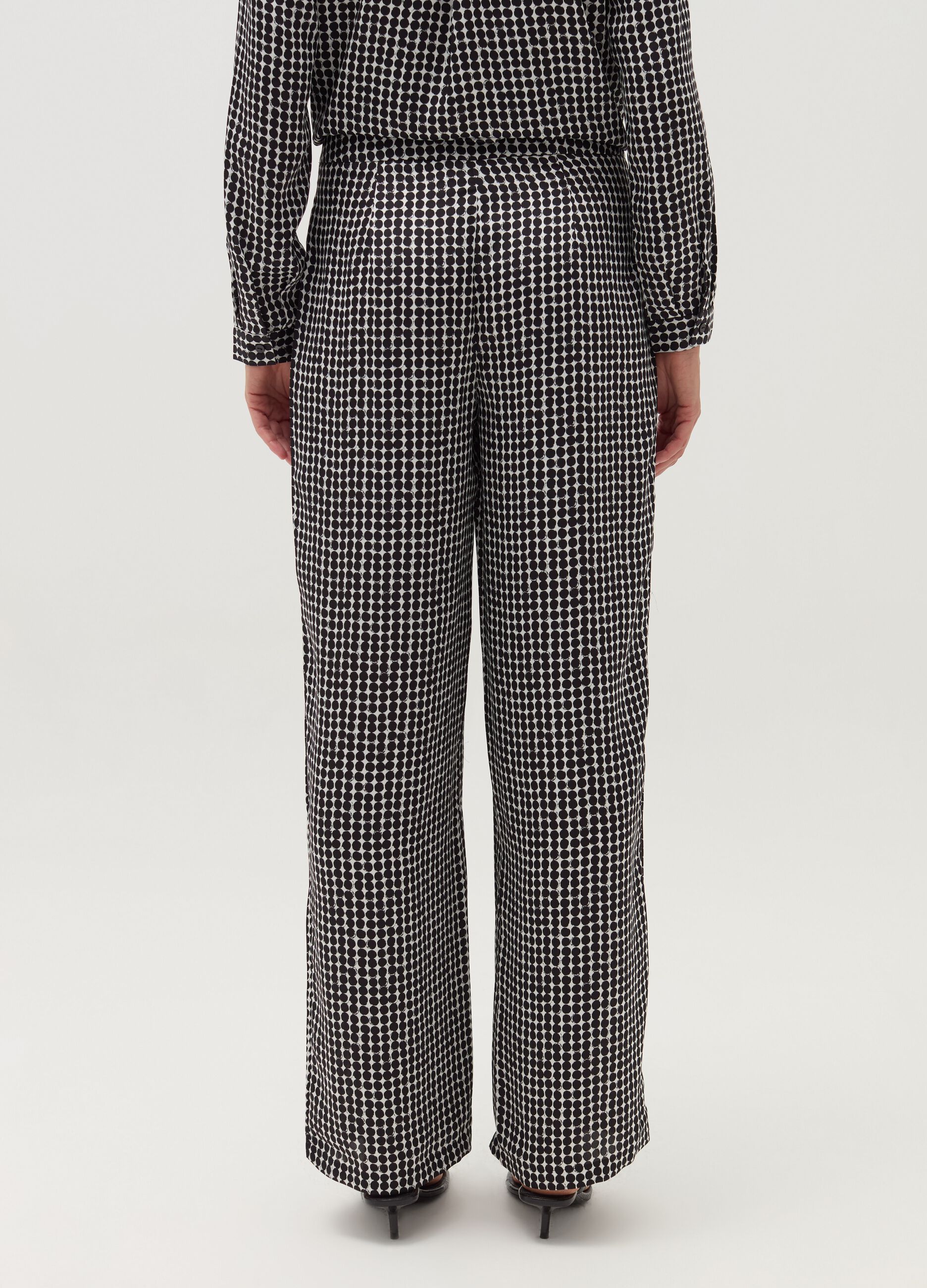 High-rise trousers with polka dot pattern