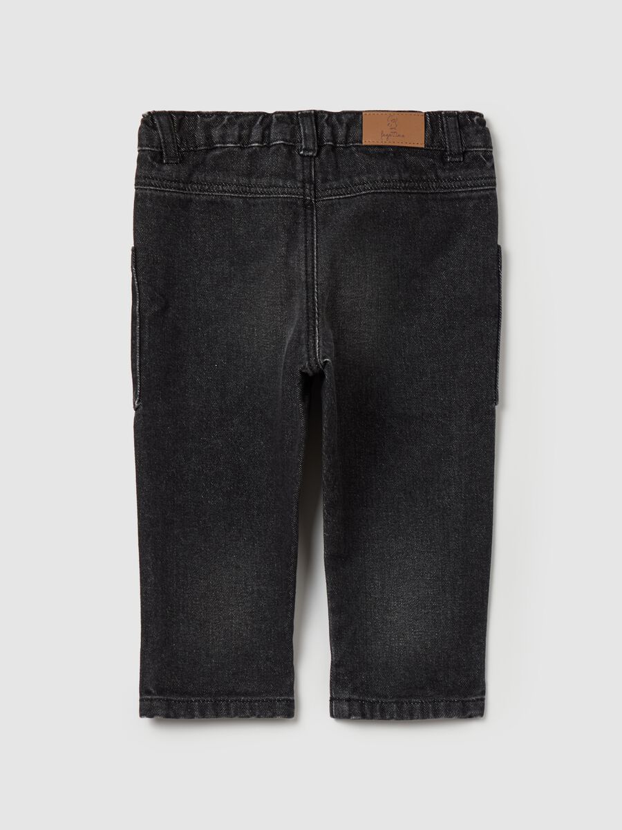 Worn-effect jeans with pockets_1