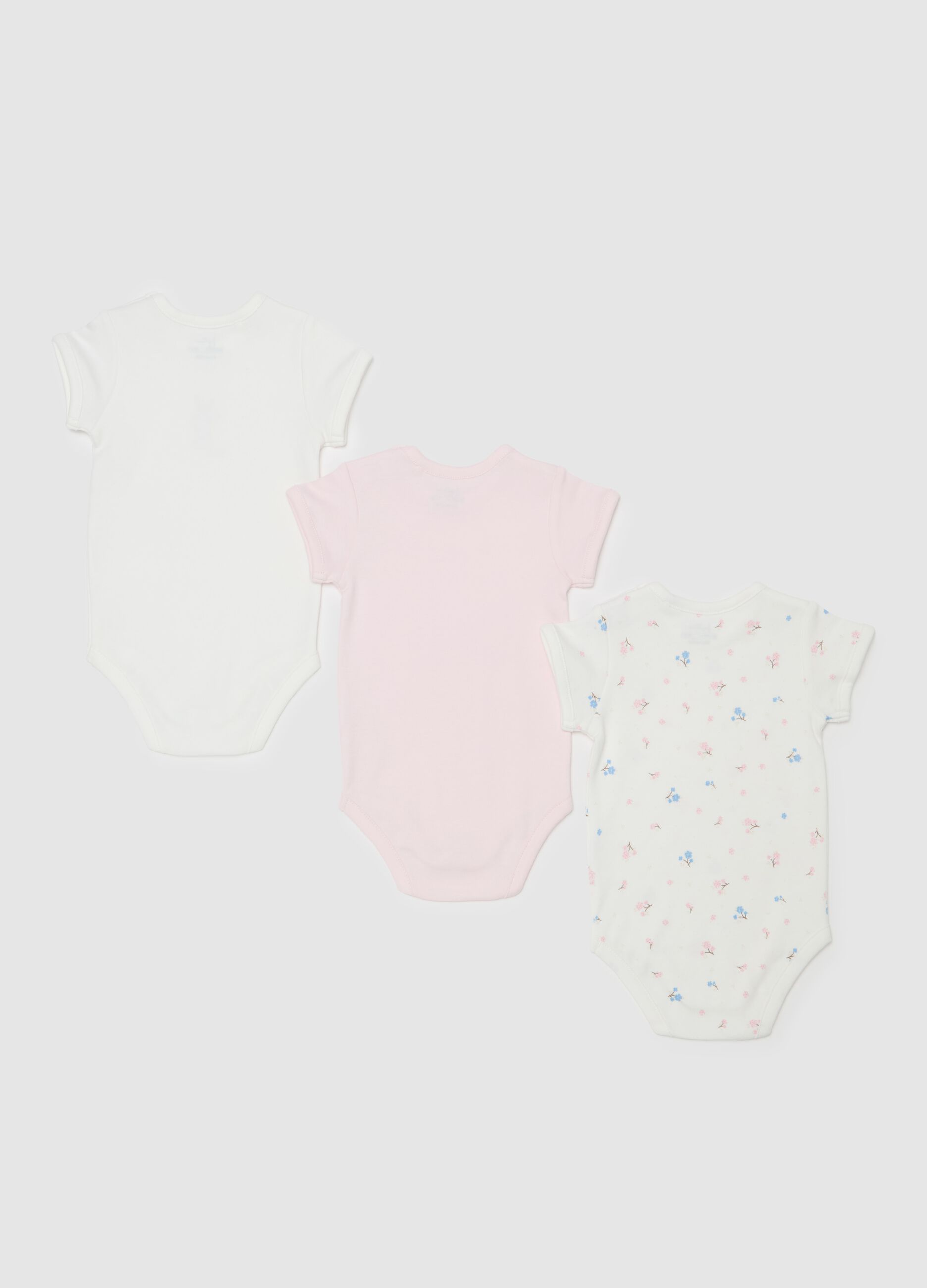 Three-pack bodysuits in organic cotton with small flowers print