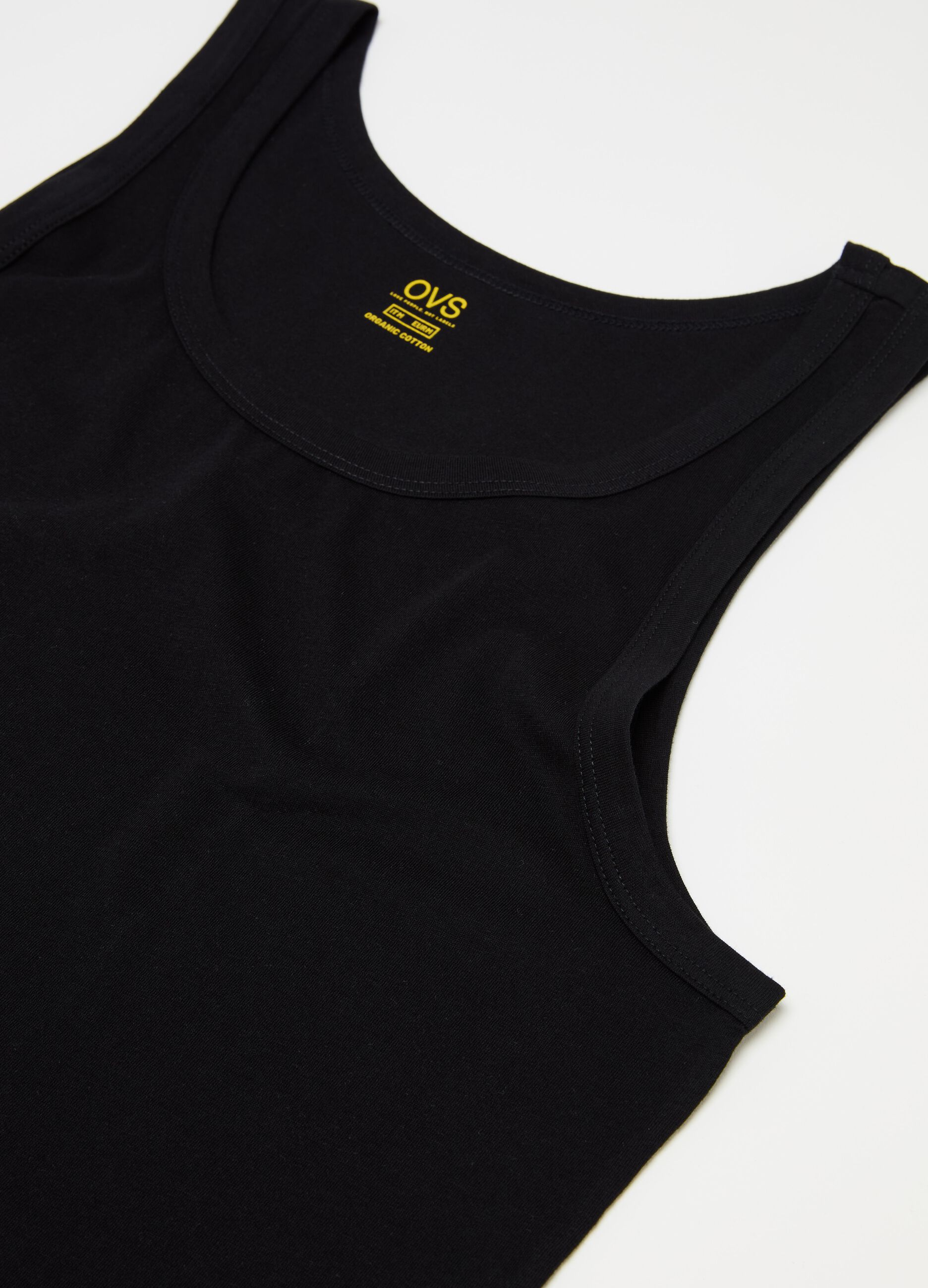 Three-pack racerback vests in organic cotton