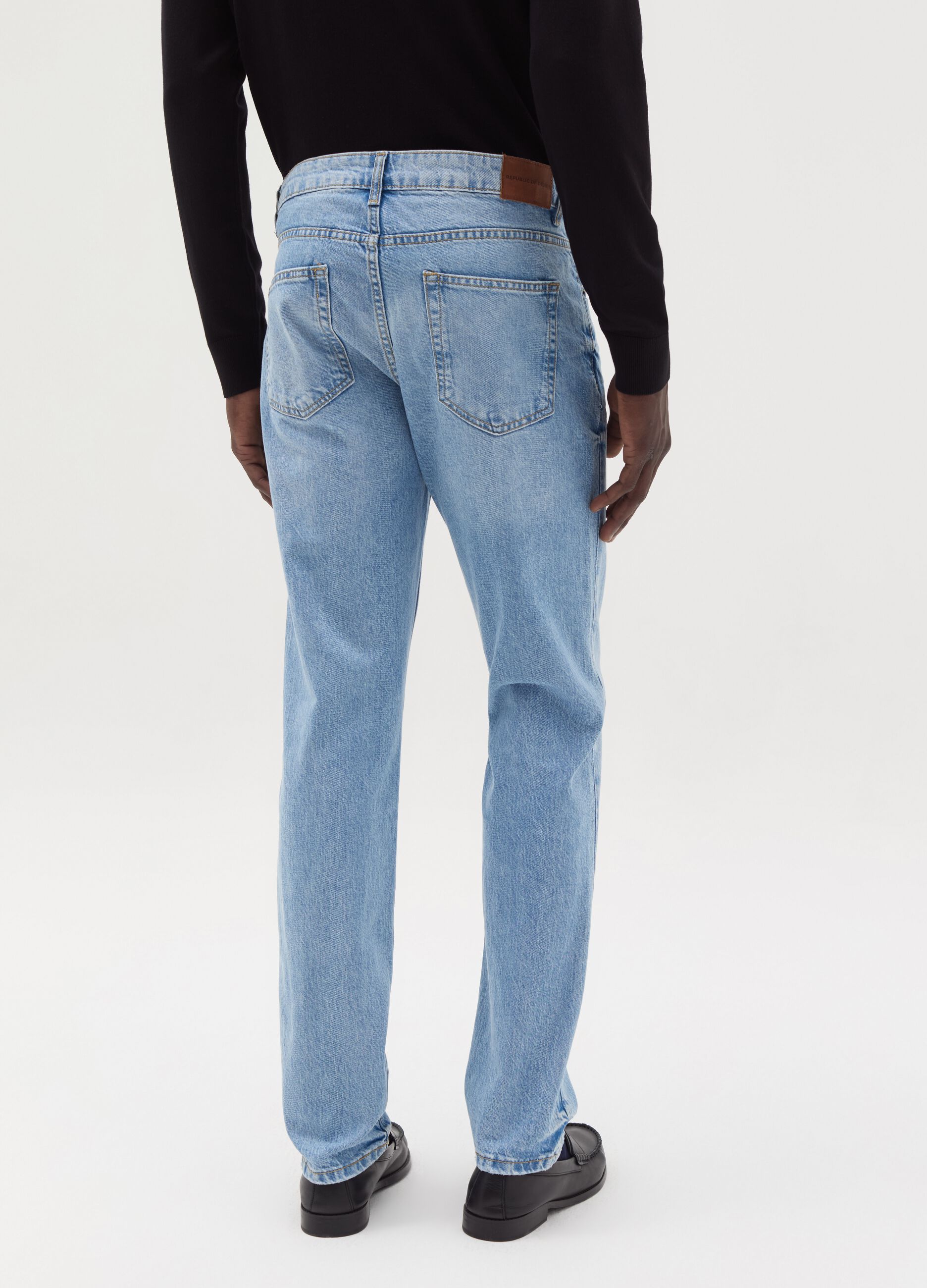 Slim-fit acid-wash jeans with fading