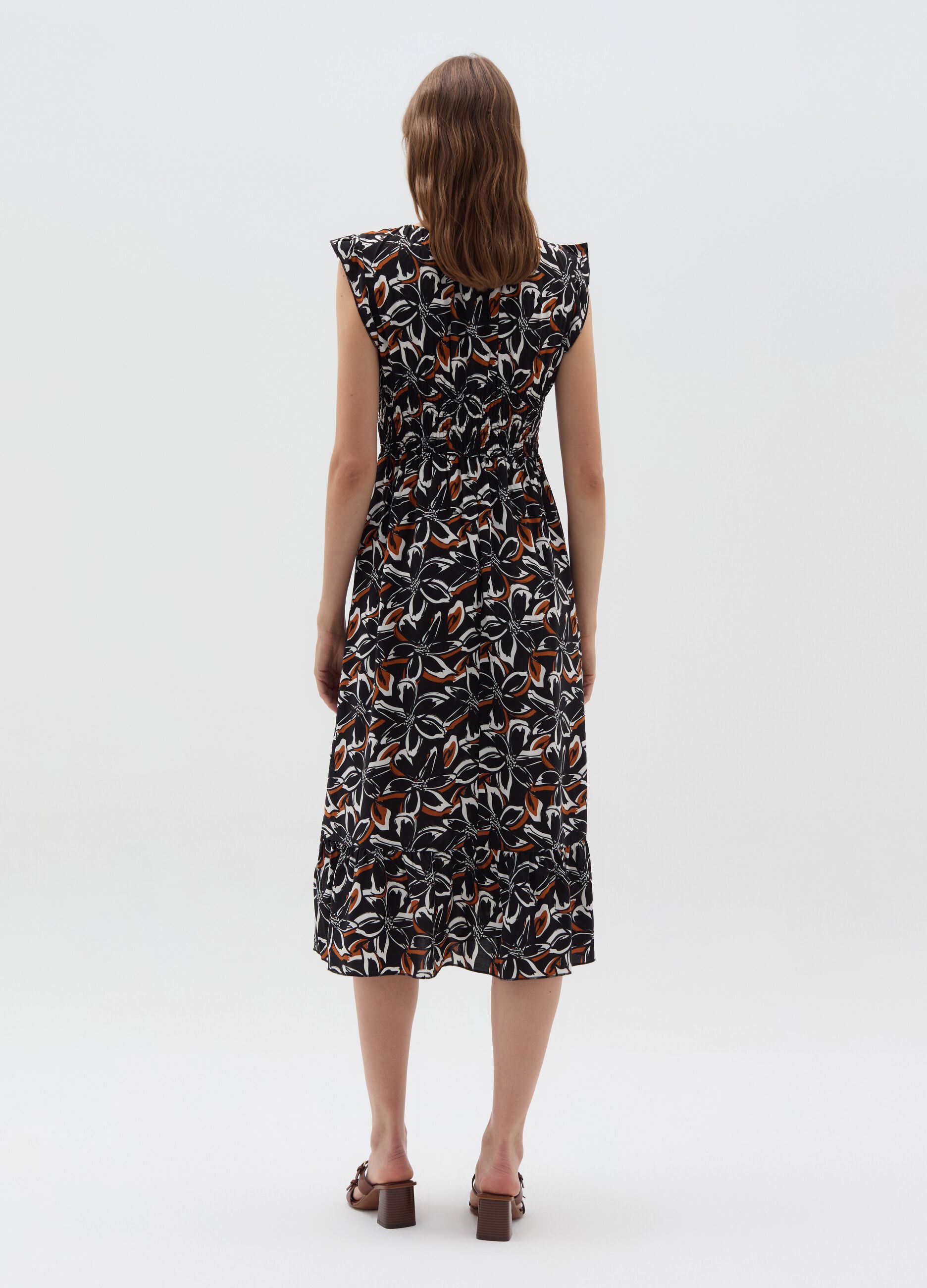 Long floral dress with smock stitch