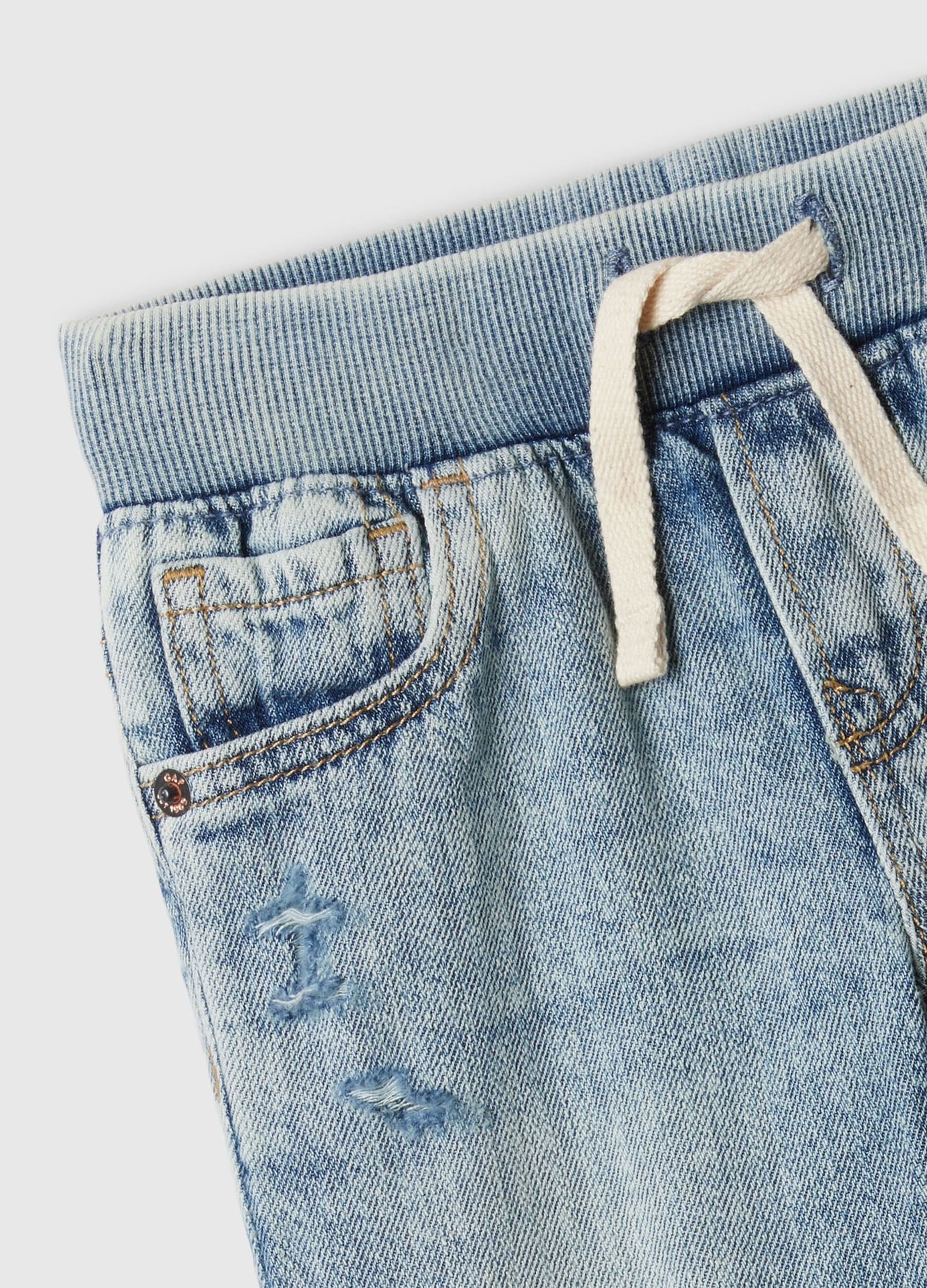 Denim joggers with drawstring and abrasions