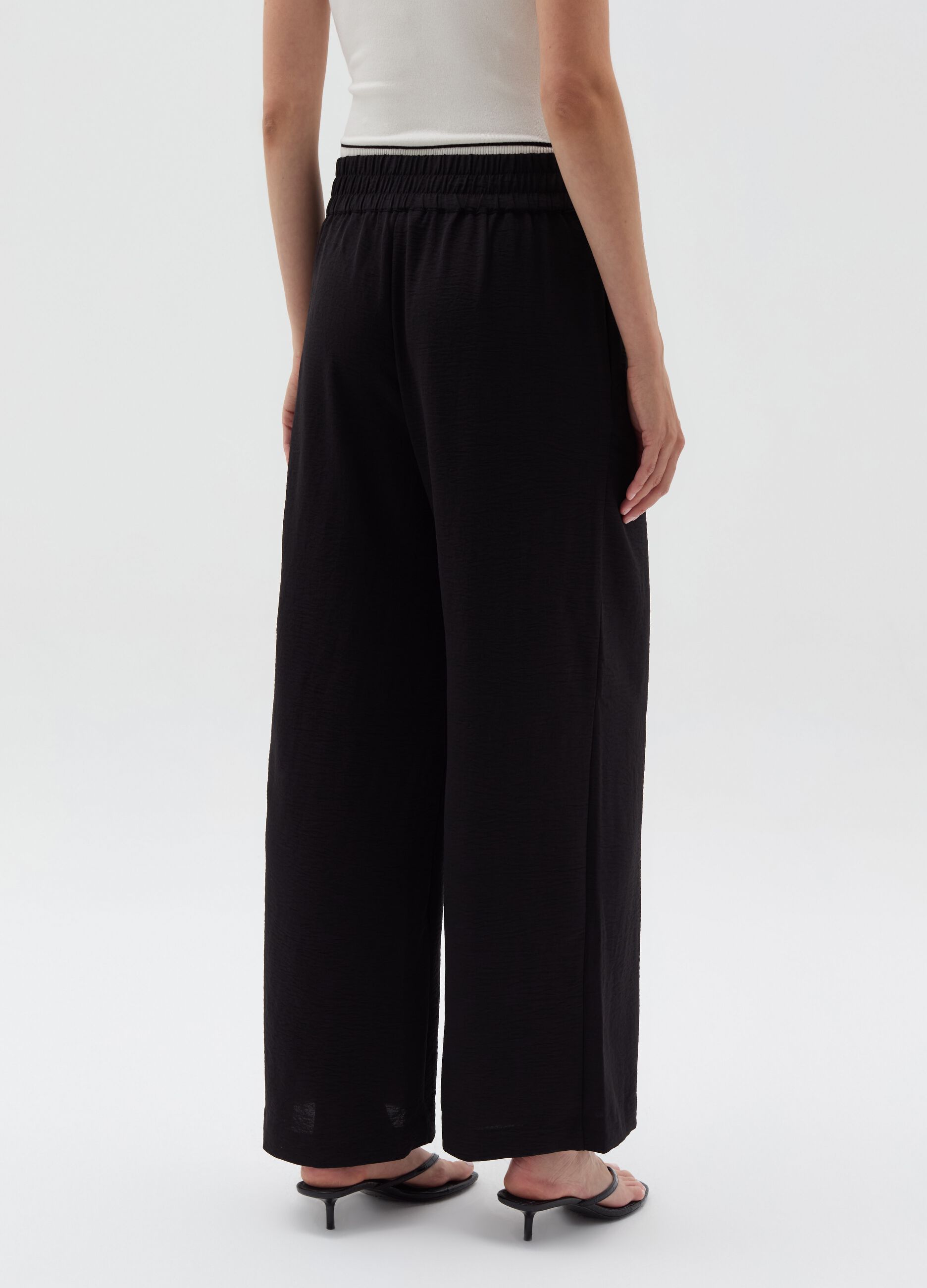 Crinkle-effect fluid trousers