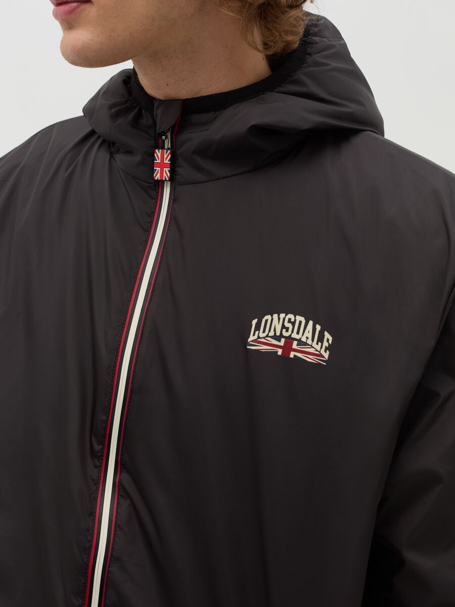 Waterproof jacket with hood and logo print_3