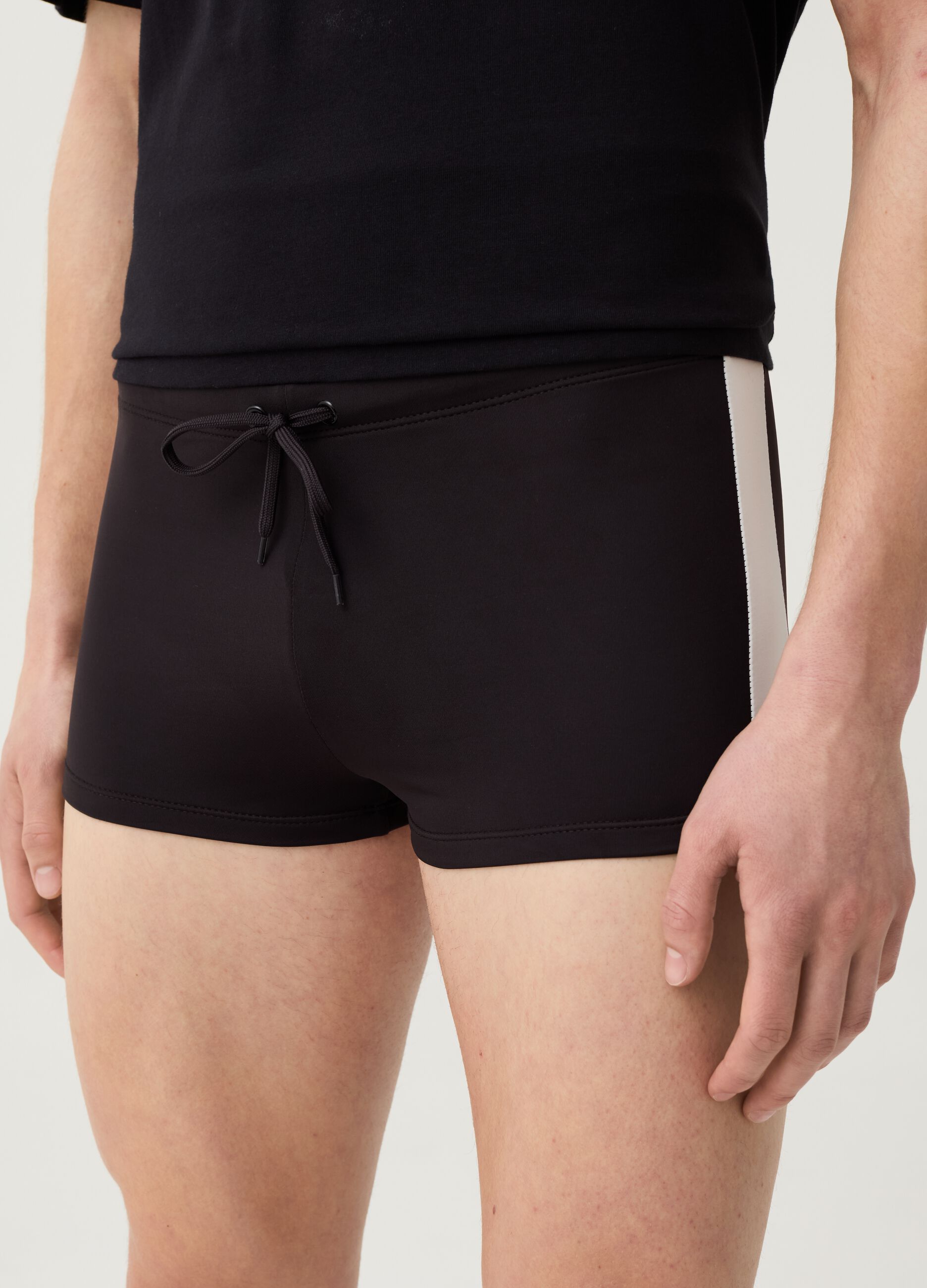 Swimming trunks with side bands