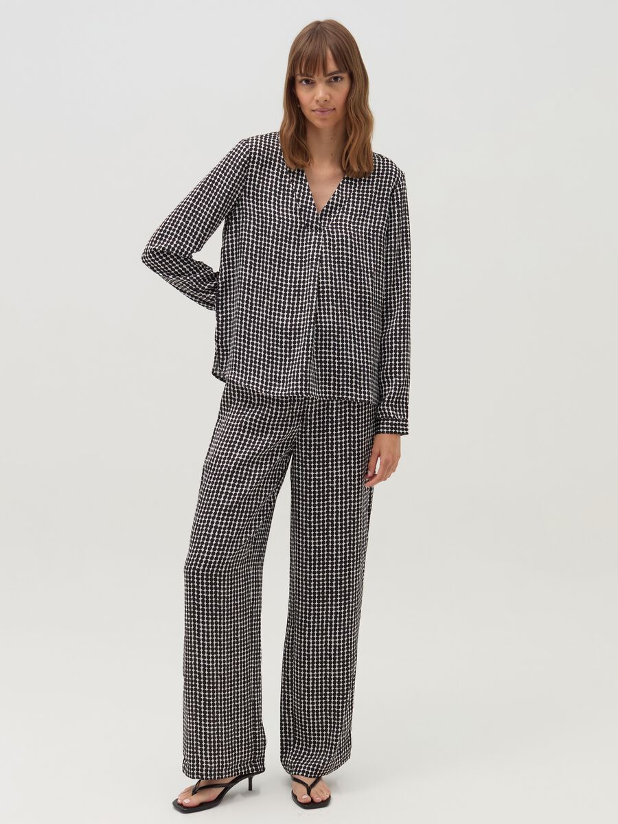 High-rise trousers with polka dot pattern_0