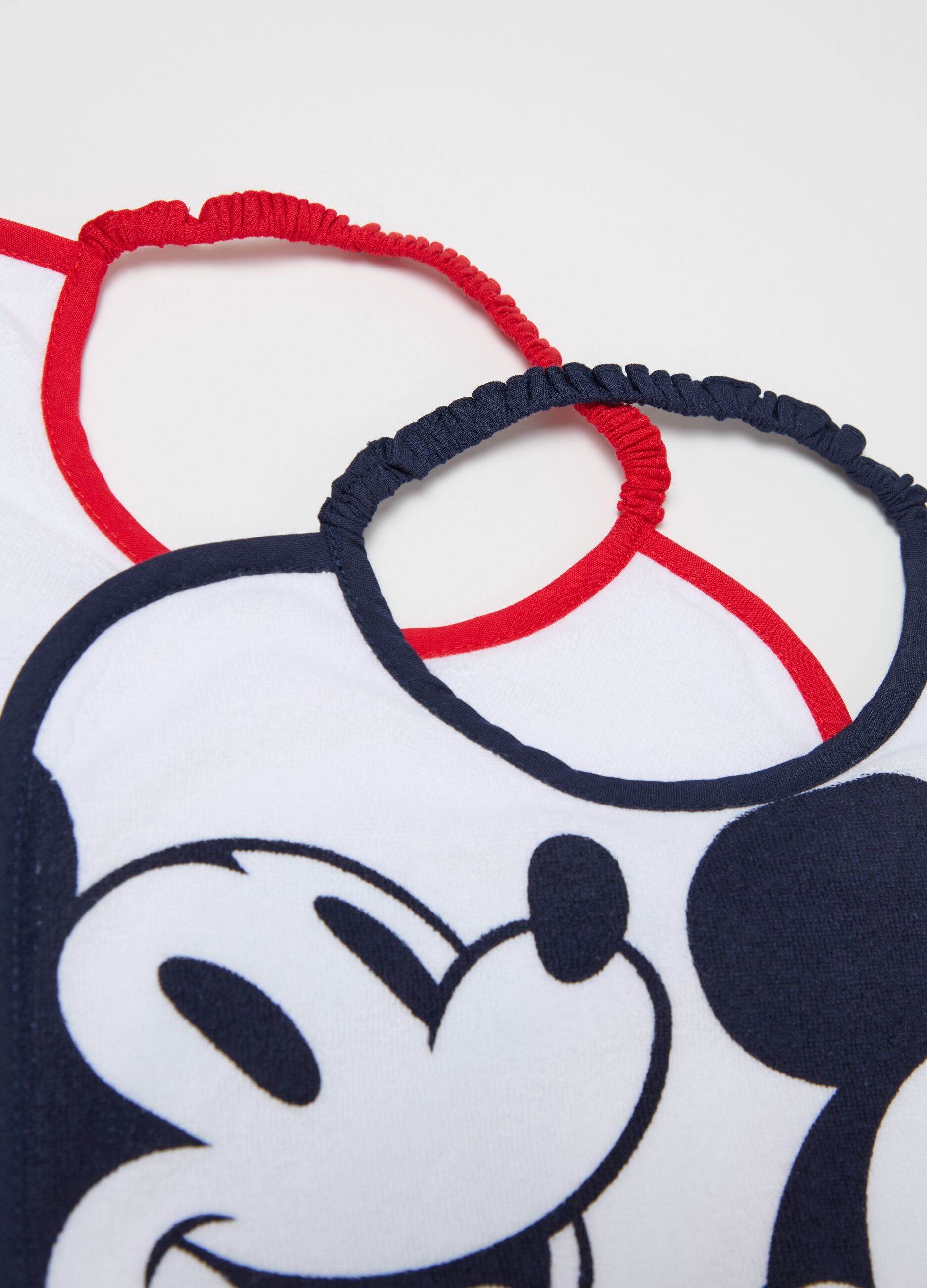 Three-pack bibs with PEVA backing and Mickey Mouse print