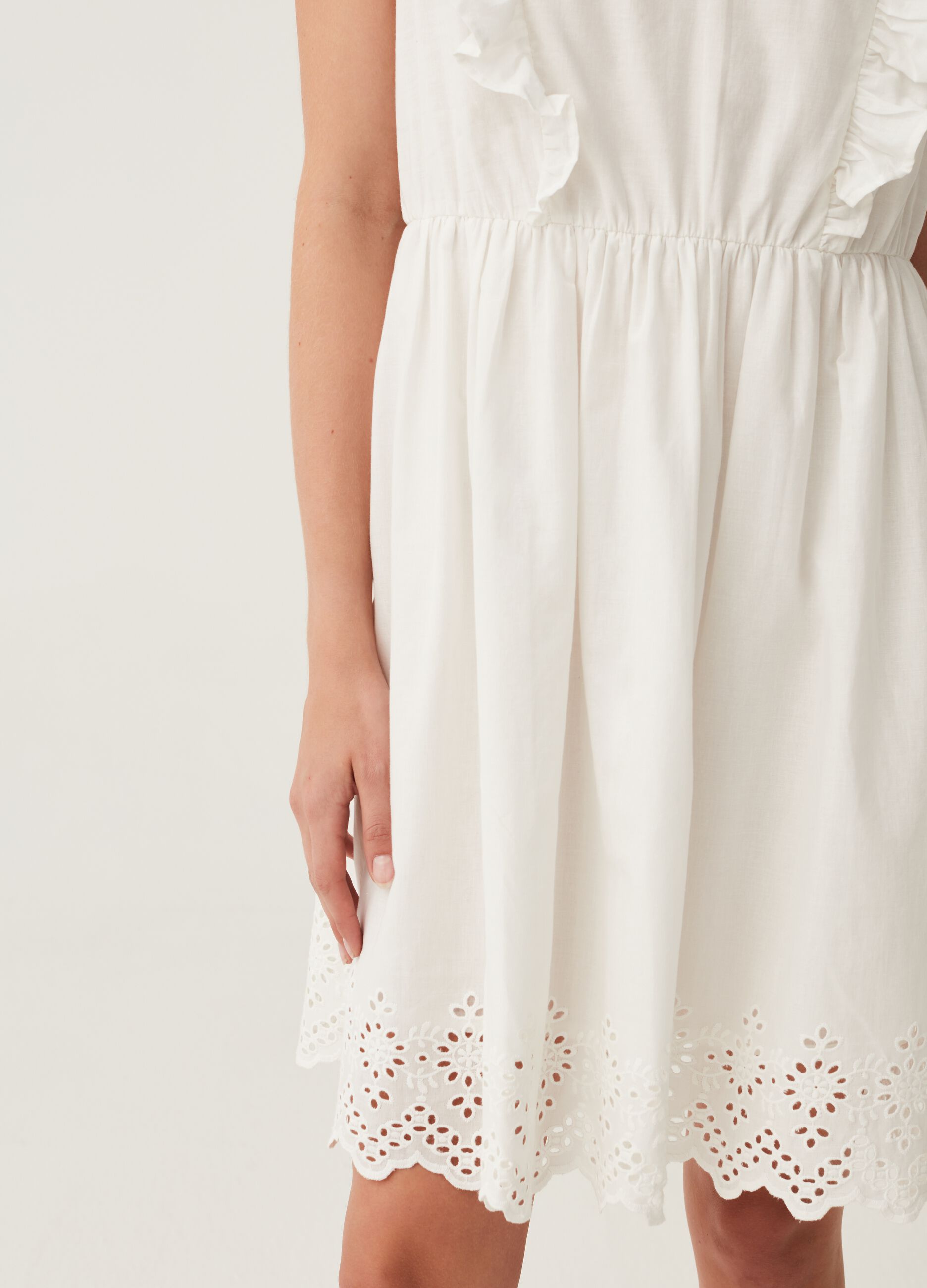 Short dress with broderie anglaise edging