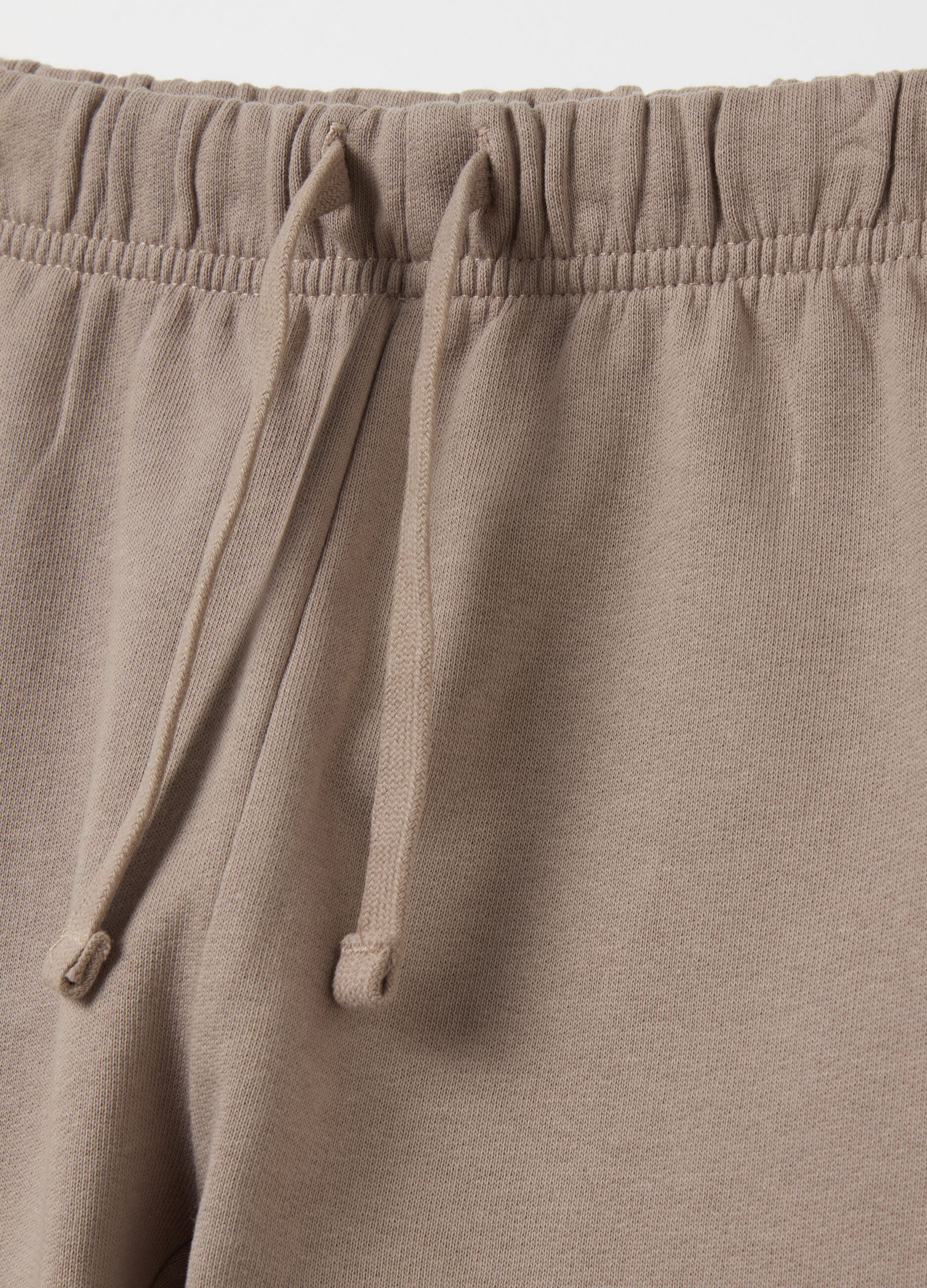 Joggers with drawstring and elasticated trims