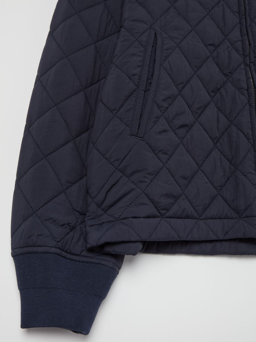 Short quilted jacket with collar in corduroy_5