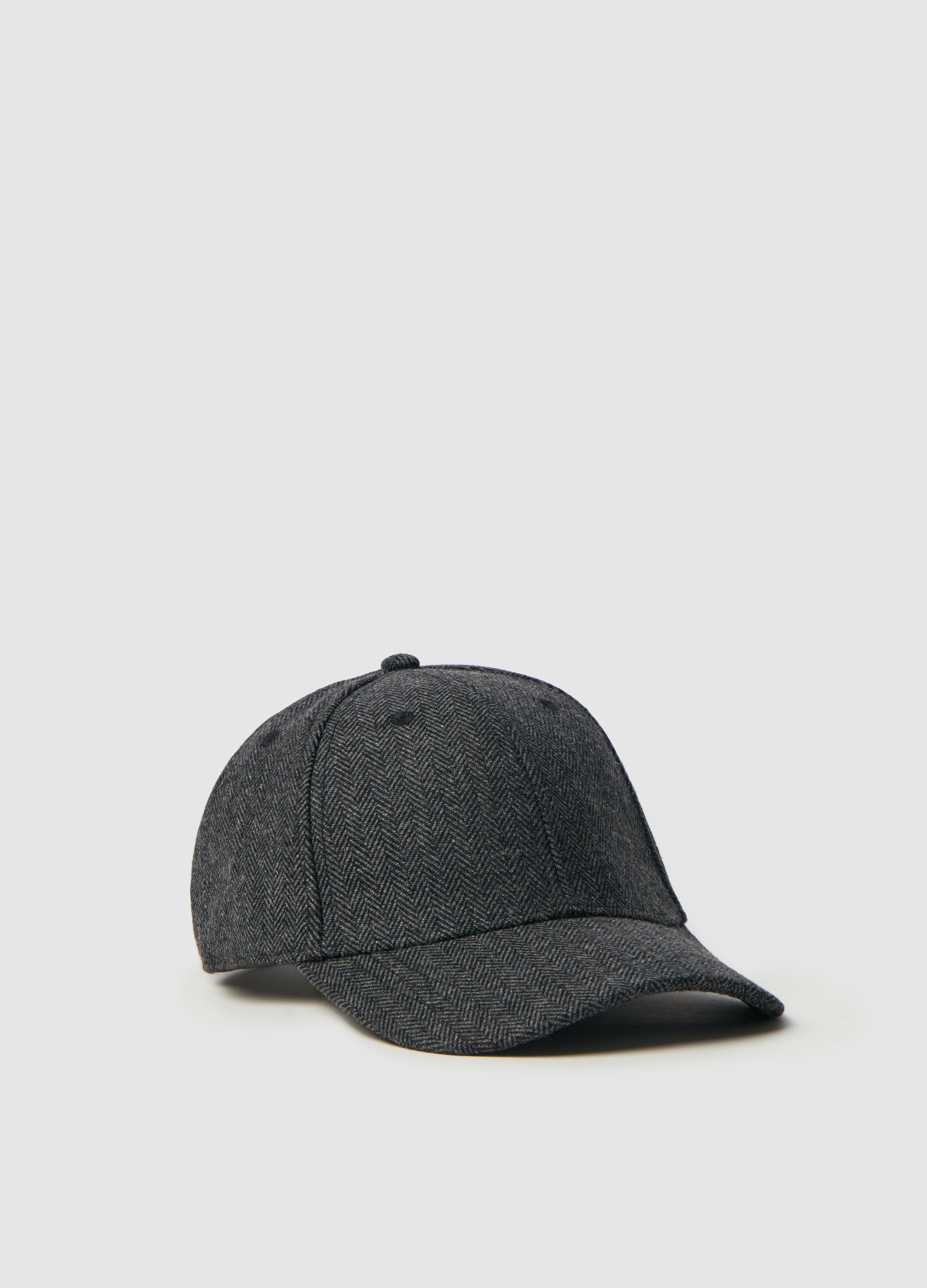 Baseball cap with houndstooth design