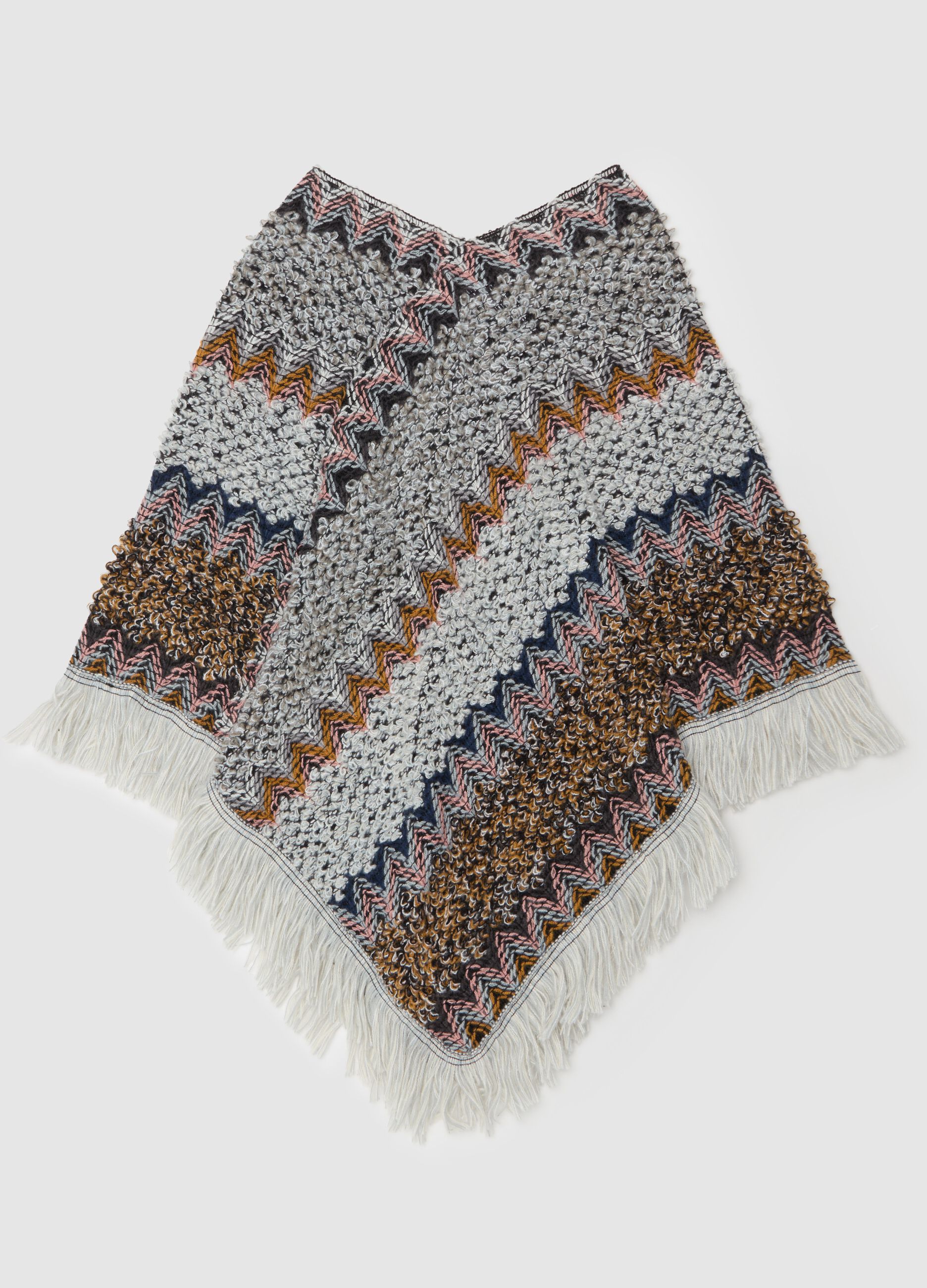 Poncho sfrangiato con lavorazione patchwork