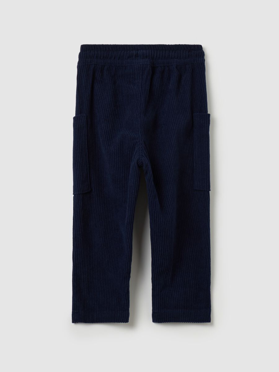 Corduroy trousers with pockets and drawstring_1