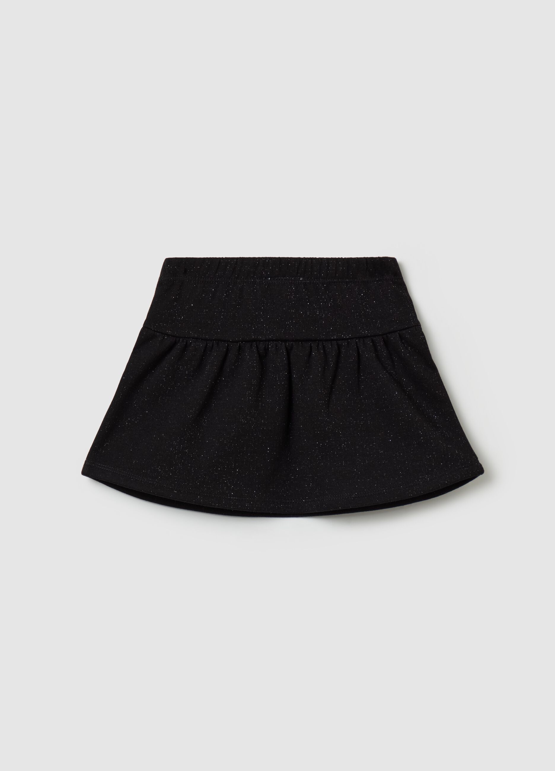 Short skirt with lurex and bow