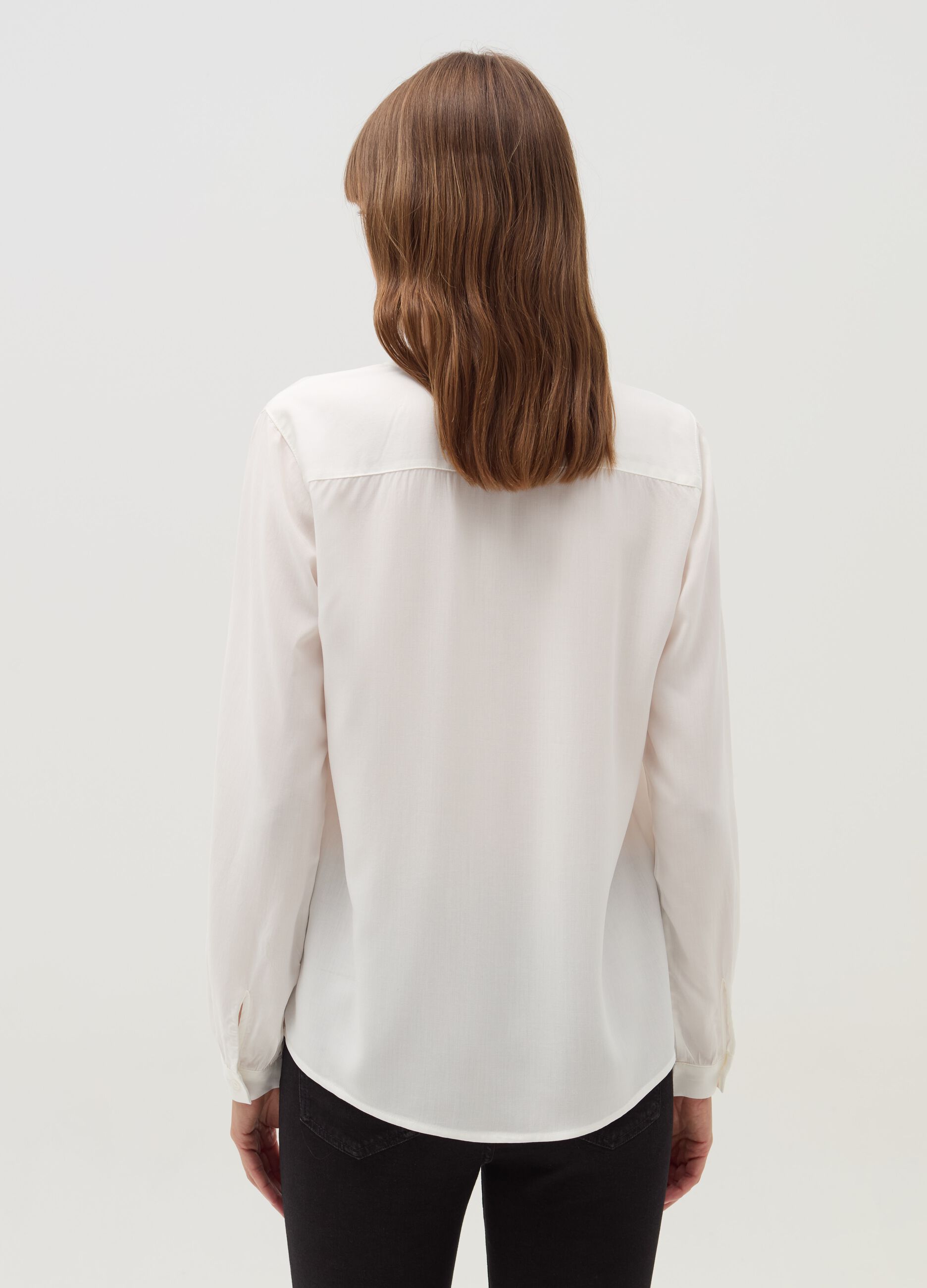 Shirt with pleated detail