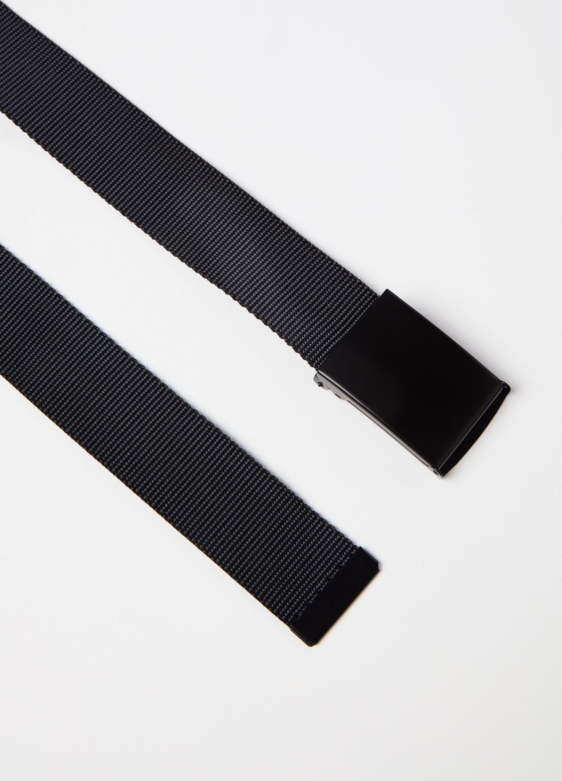 Ribbon belt with sliding buckle