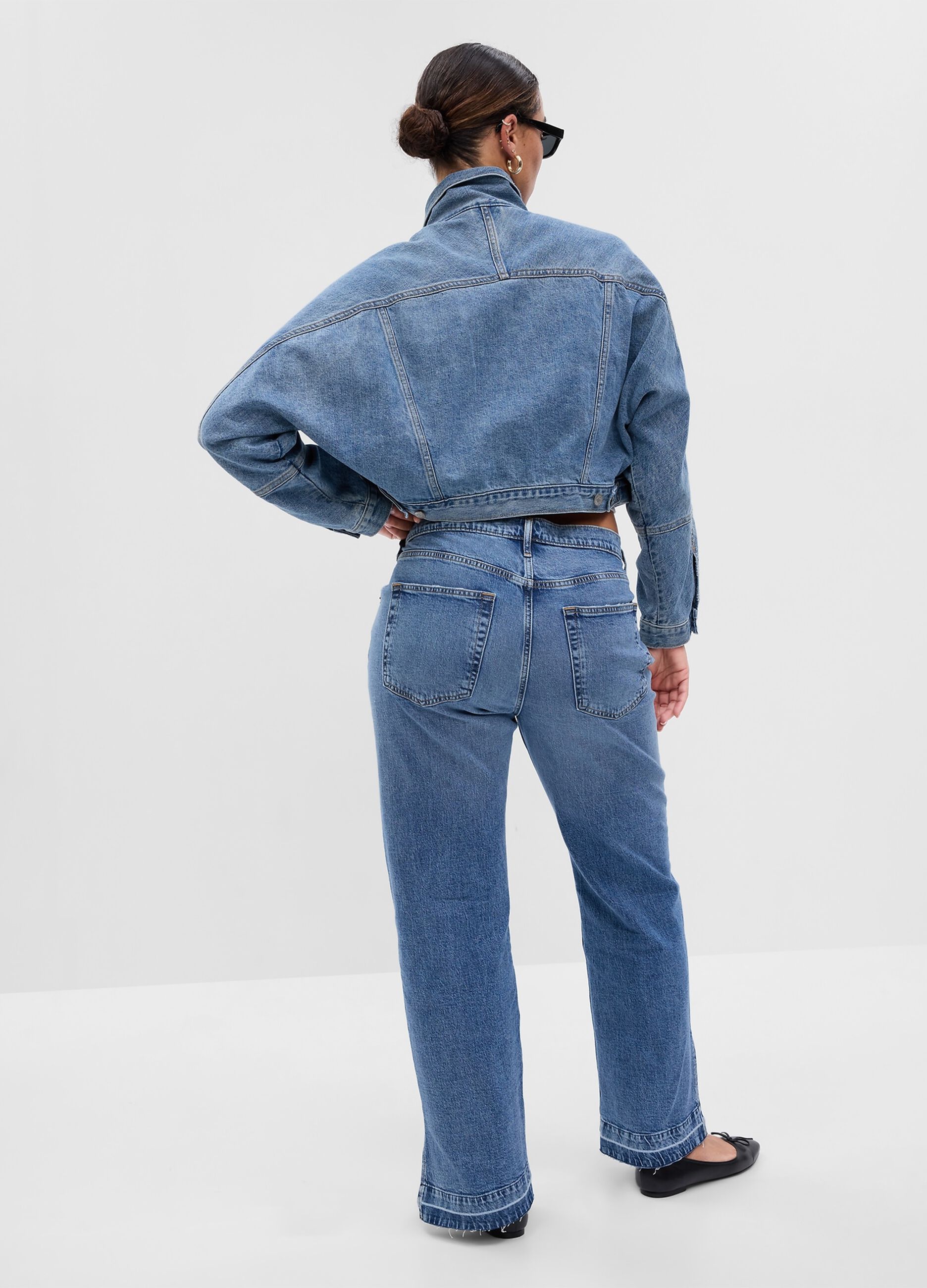 Loose-fit high-rise jeans with acid wash treatment