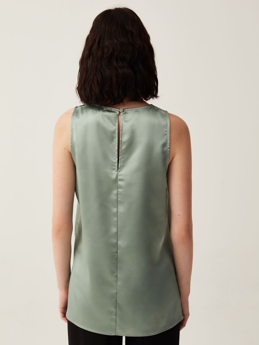 Sleeveless blouse in satin with splits_1