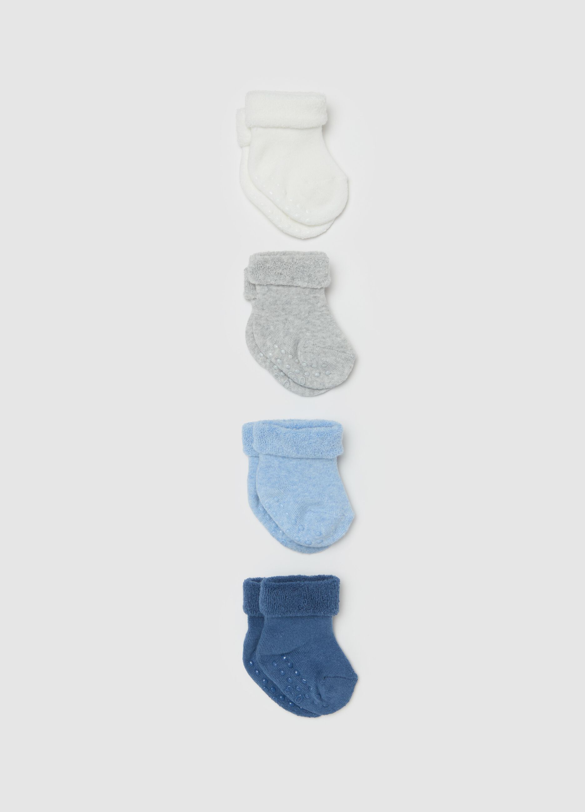 Four-pair pack socks in solid colour terry