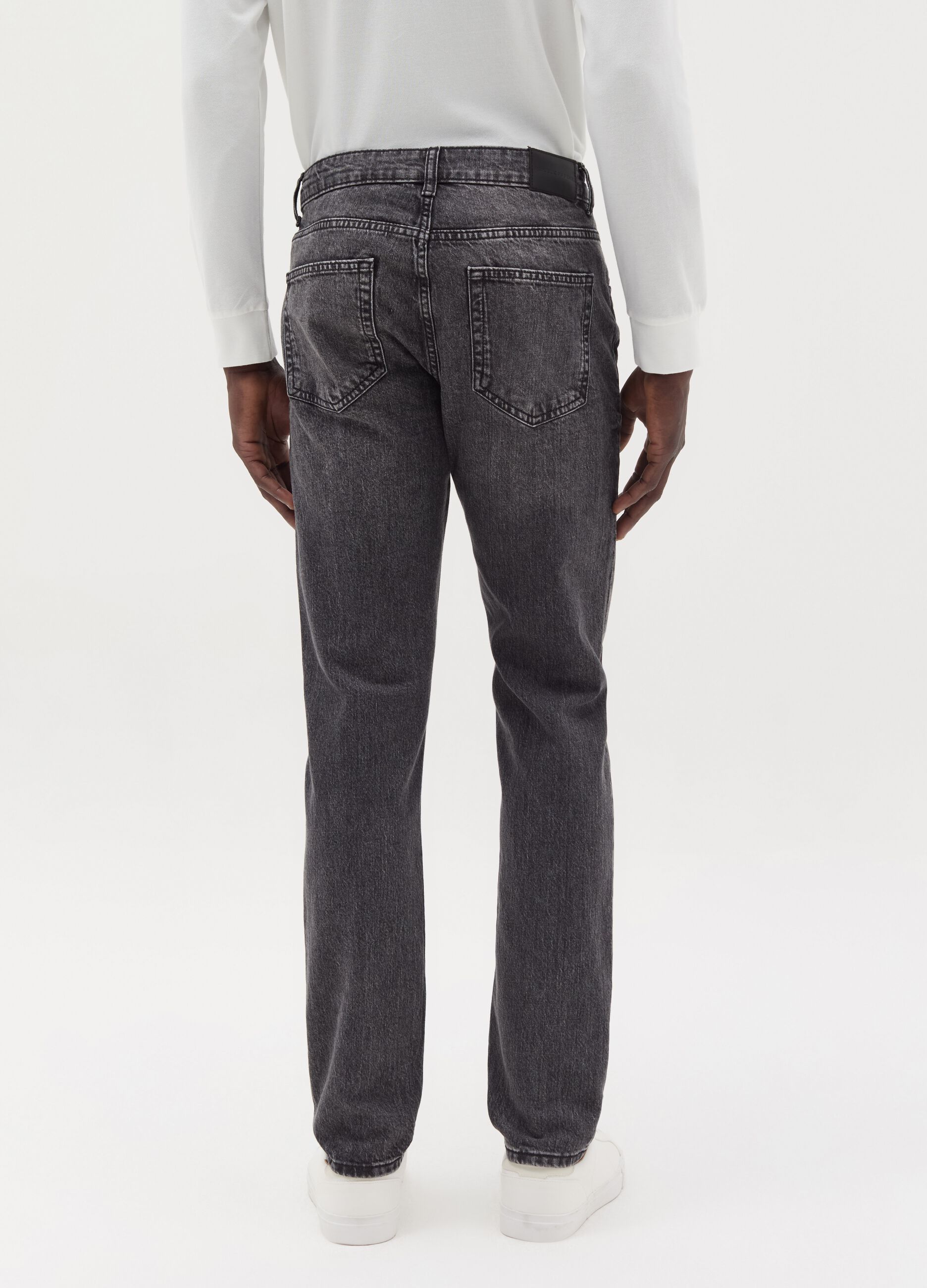 Slim-fit acid-wash jeans with fading