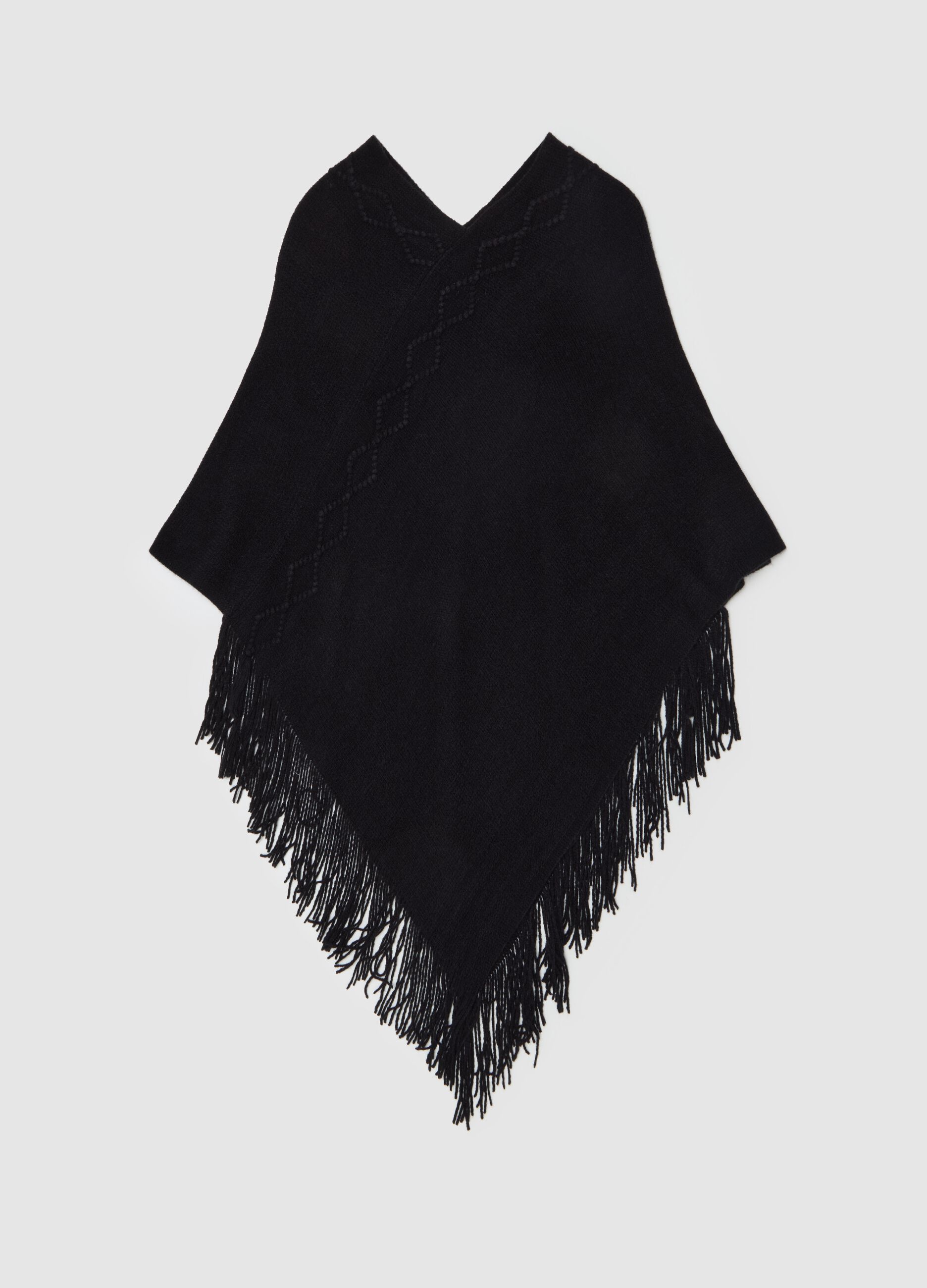 Poncho with diamond design and fringing