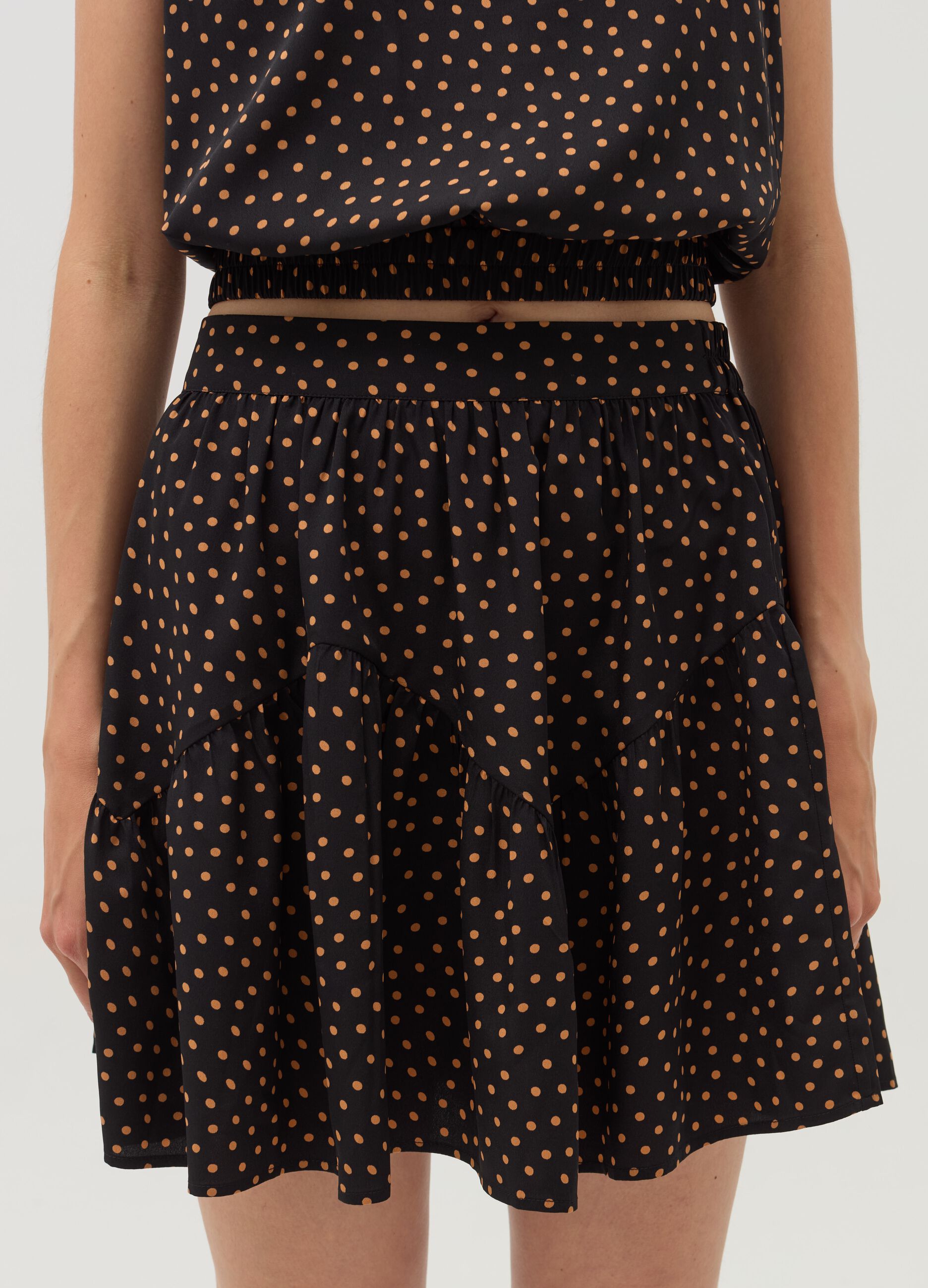 Short polka dot skirt with flounce