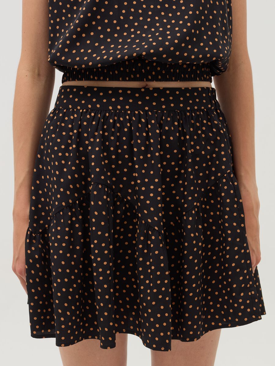 Short polka dot skirt with flounce_1