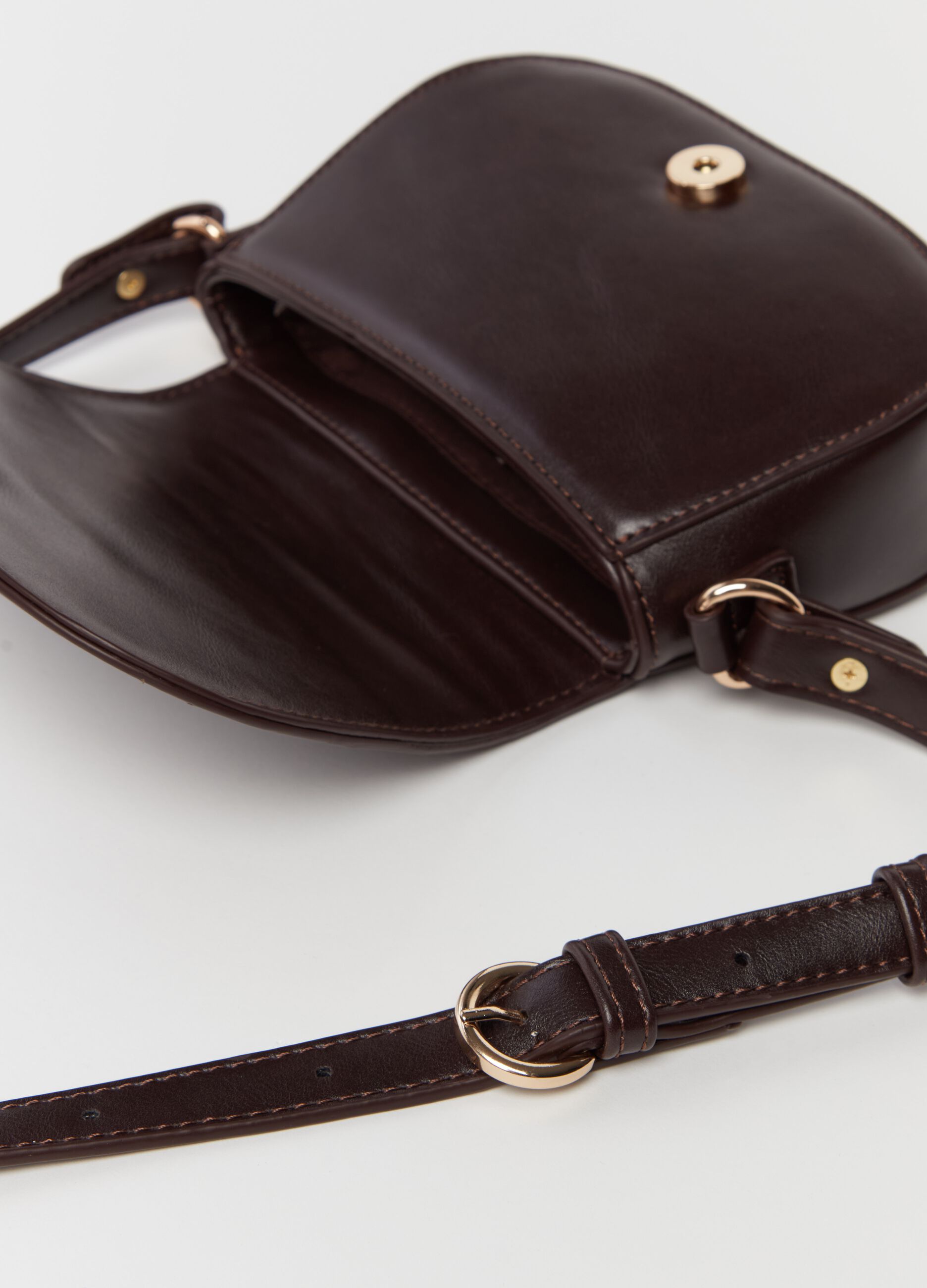 Rounded bag with shoulder strap