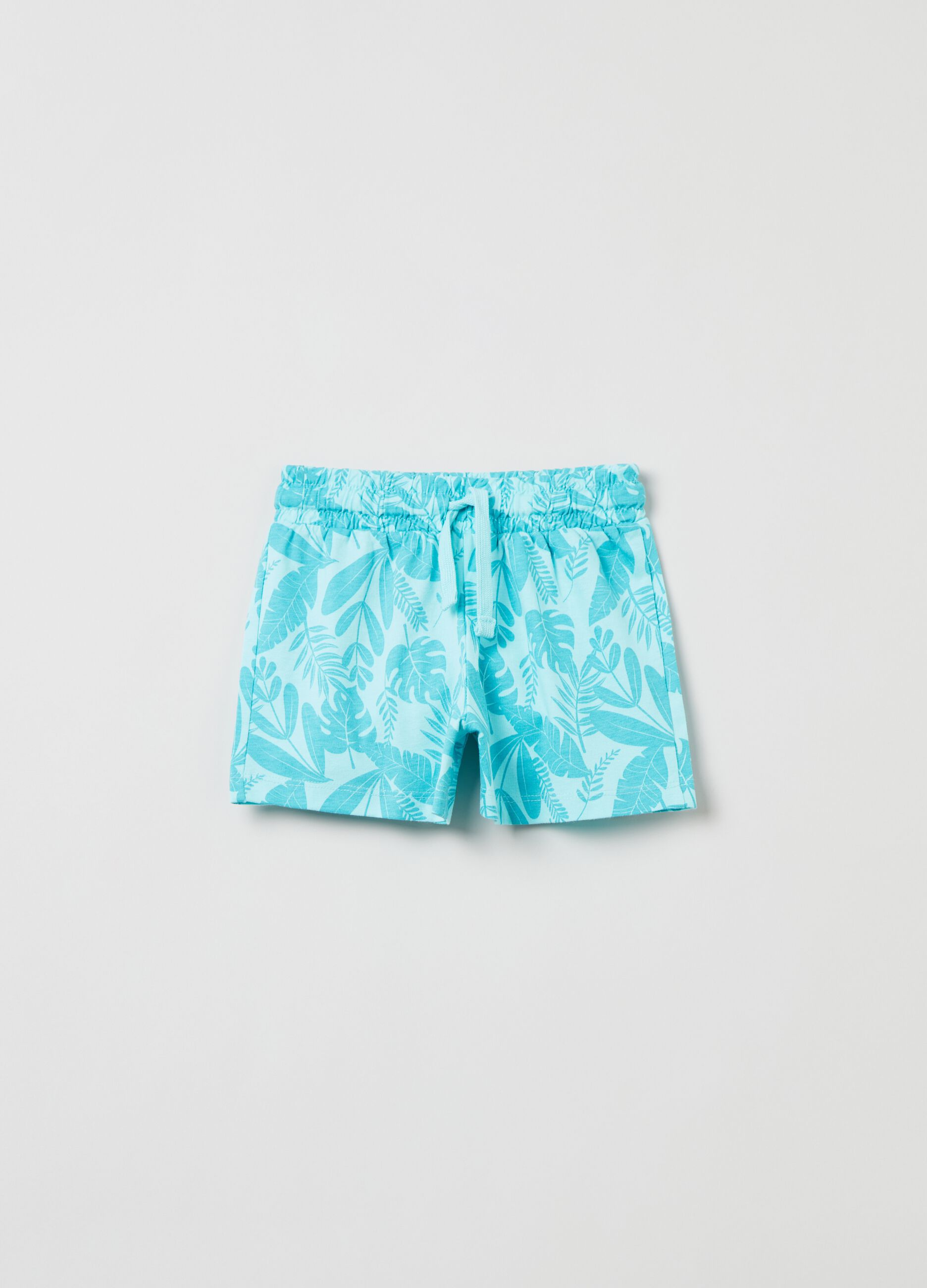 Shorts with all-over tropical leaves print