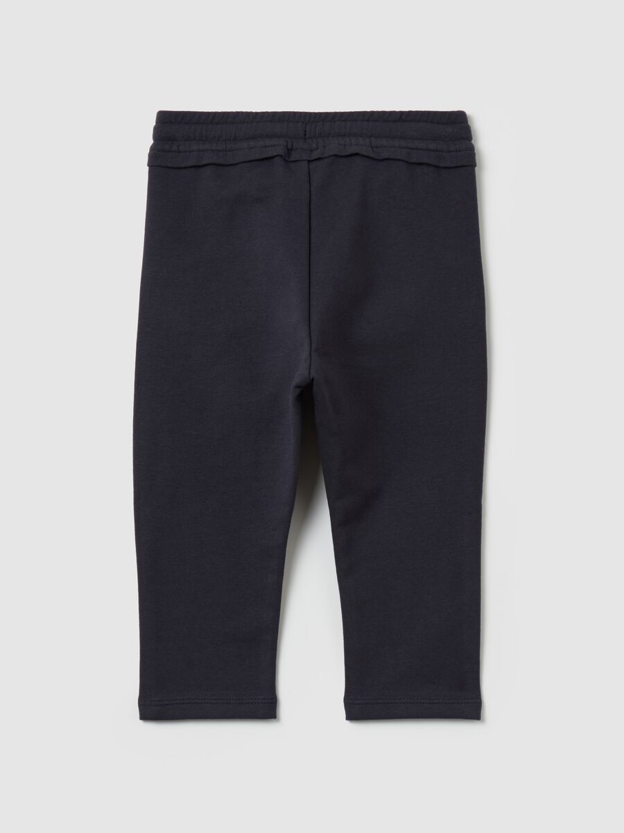 Fleece joggers with pockets and drawstring_1