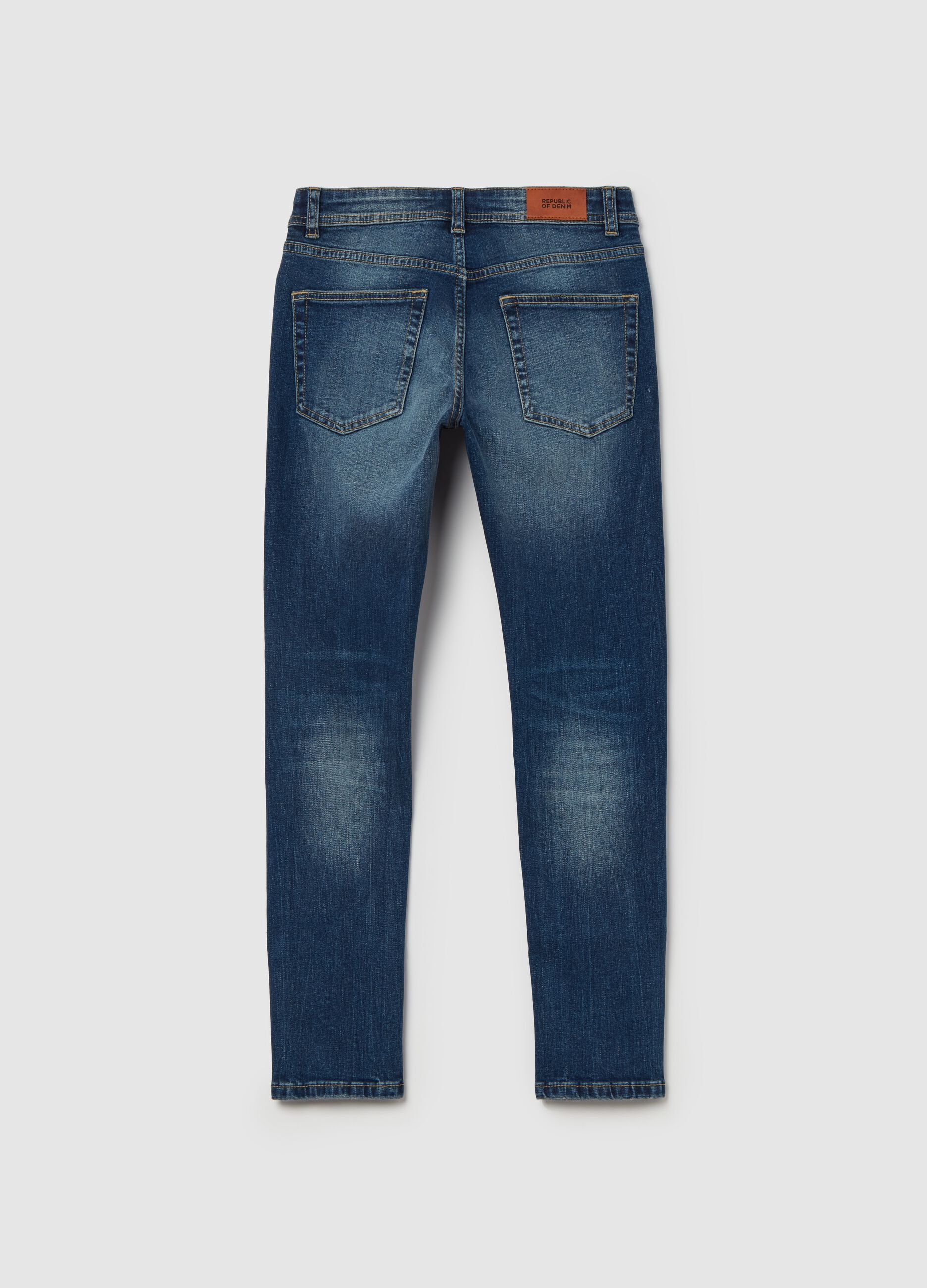 Jeans slim fit cinque tasche con abrasioni