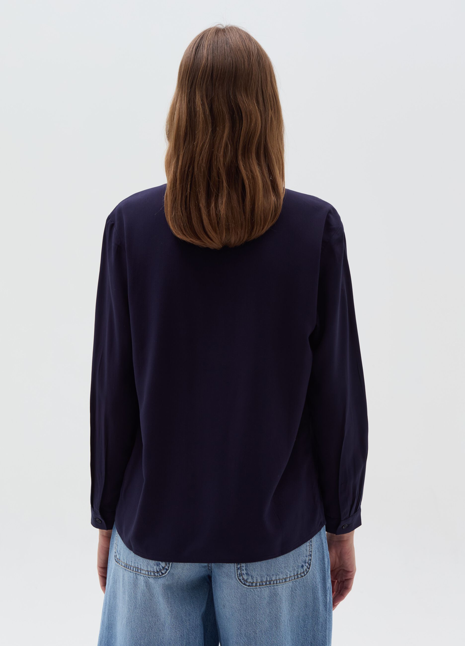 Blouse with polo neckline and long sleeves