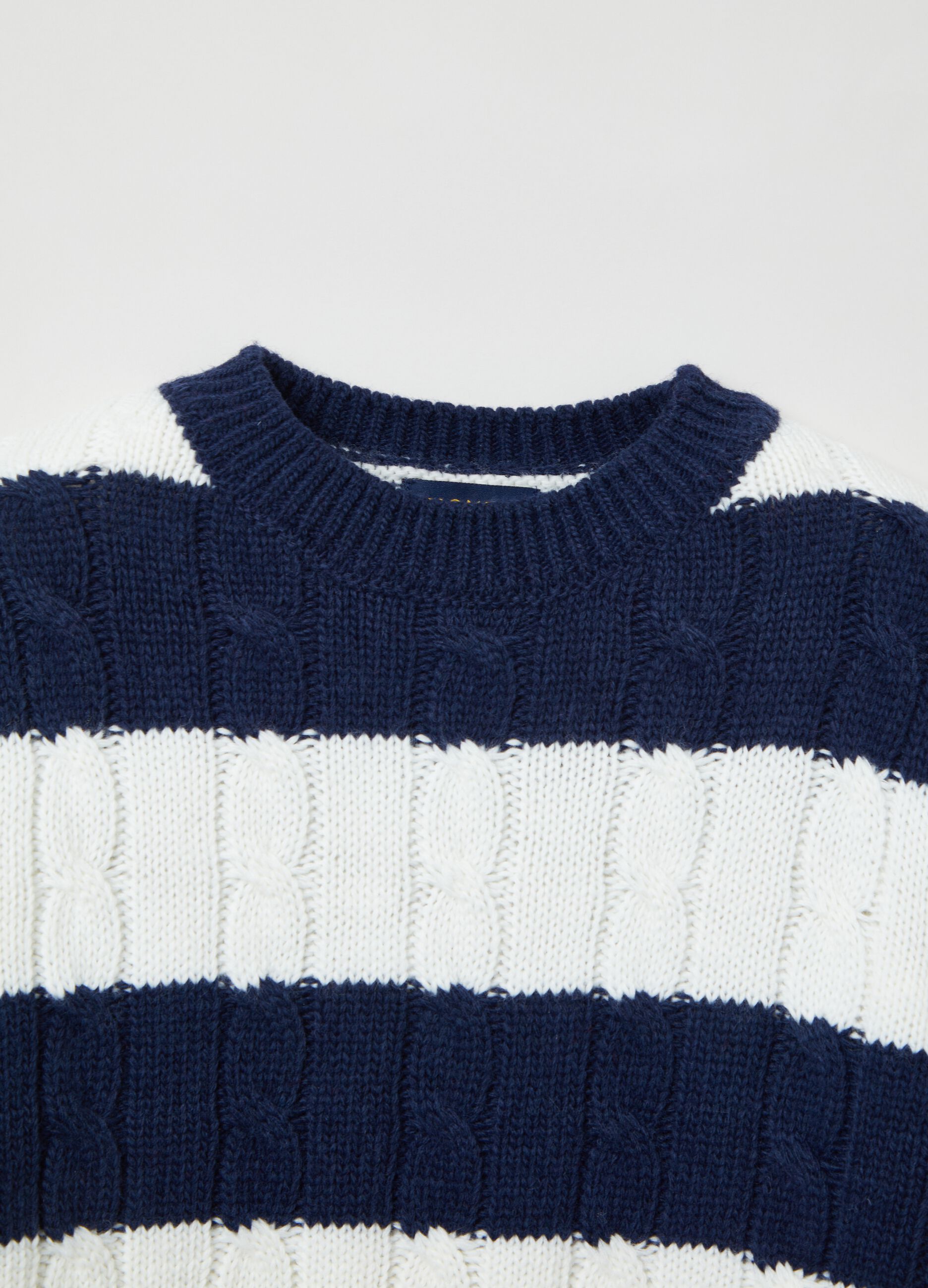 Striped pullover with cable-knit design