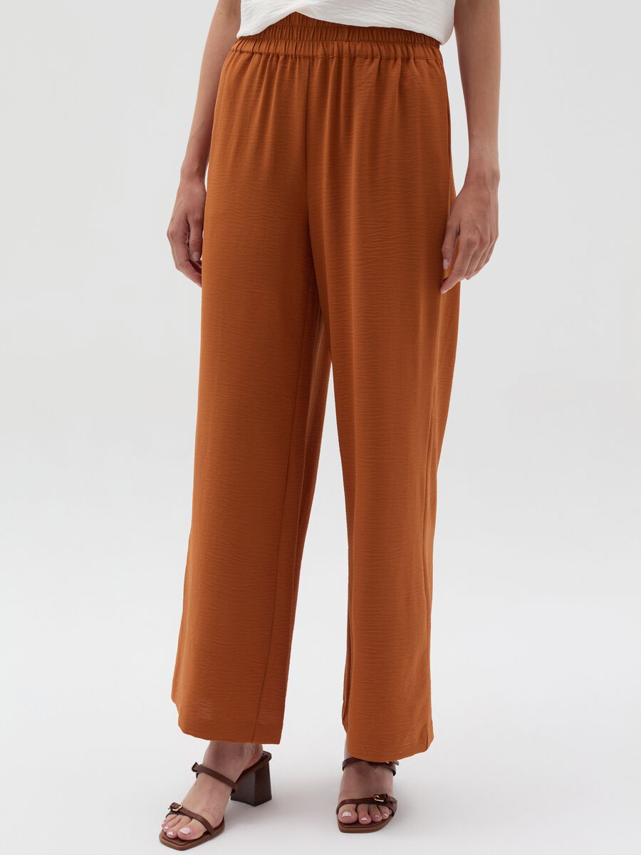 Crinkle-effect fluid trousers_1