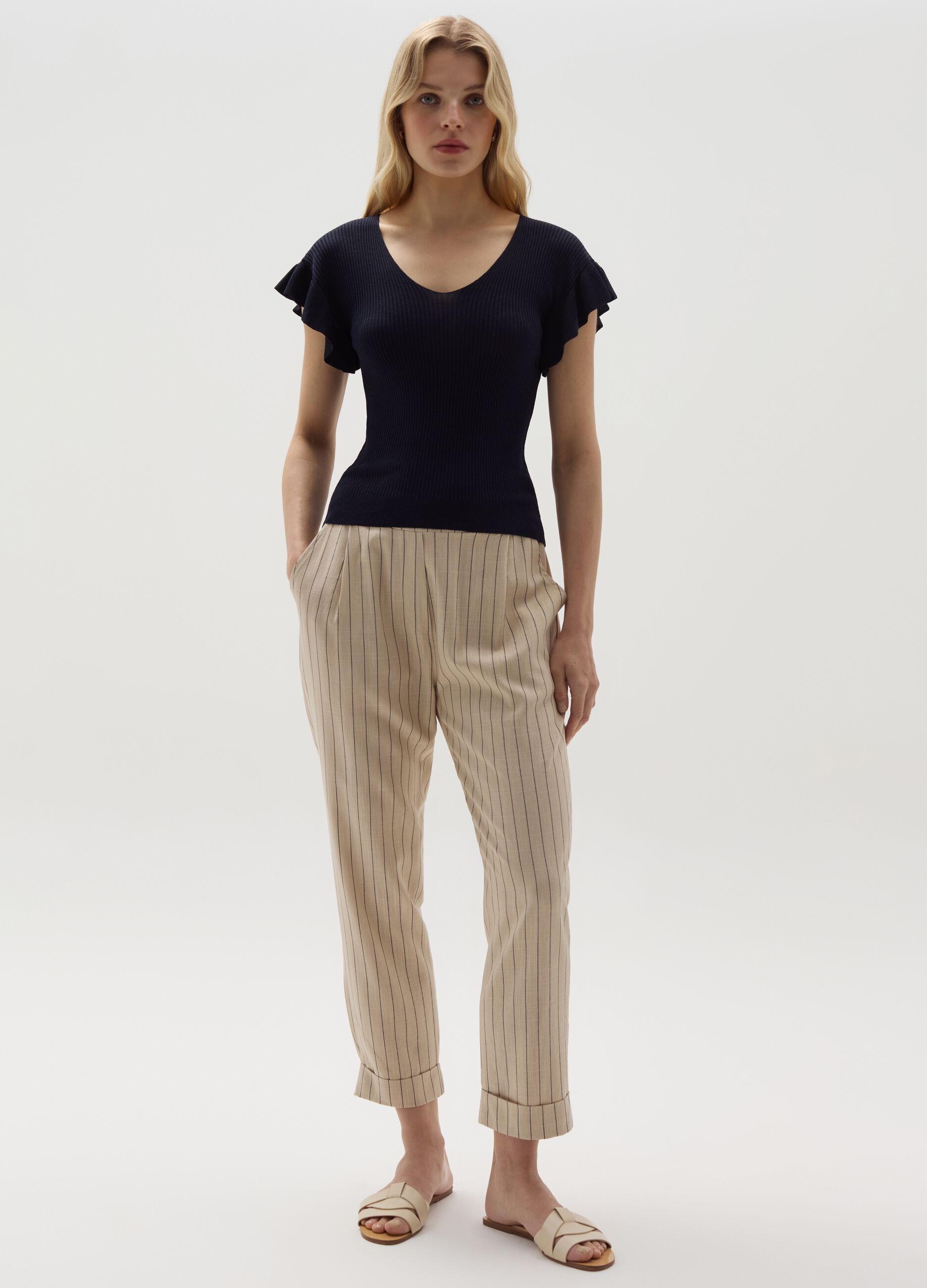 Cropped pinstriped cigarette trousers