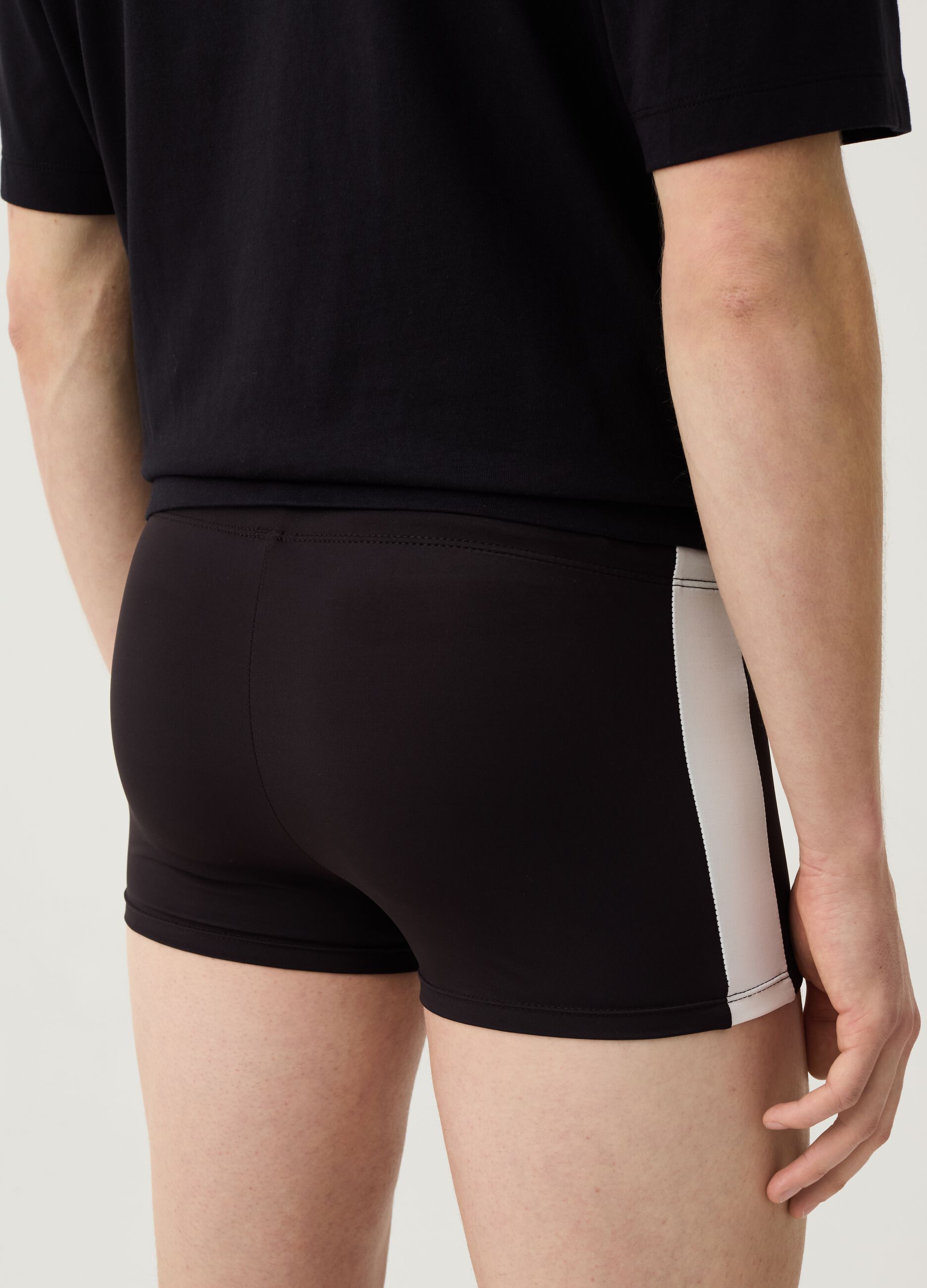 Swimming trunks with side bands
