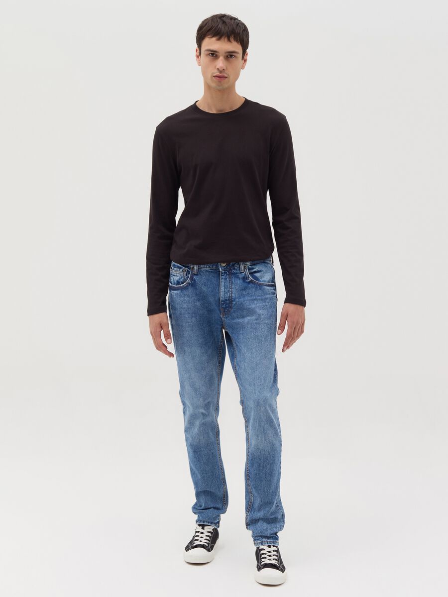 Slim-fit acid-wash jeans with fading_0